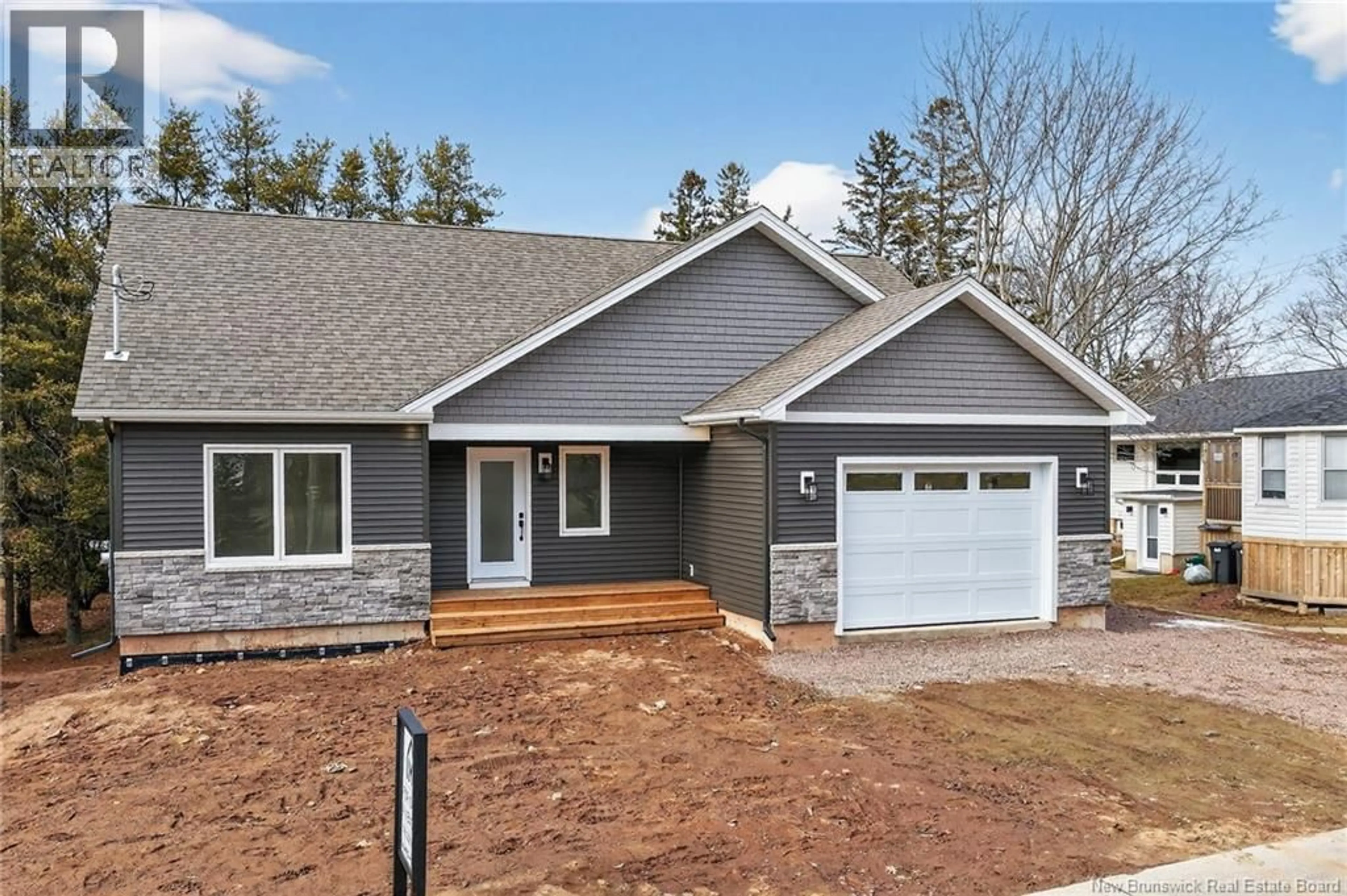 Home with vinyl exterior material, street for 214 BREAUX BRIDGE STREET, Shediac New Brunswick E4P0Y3