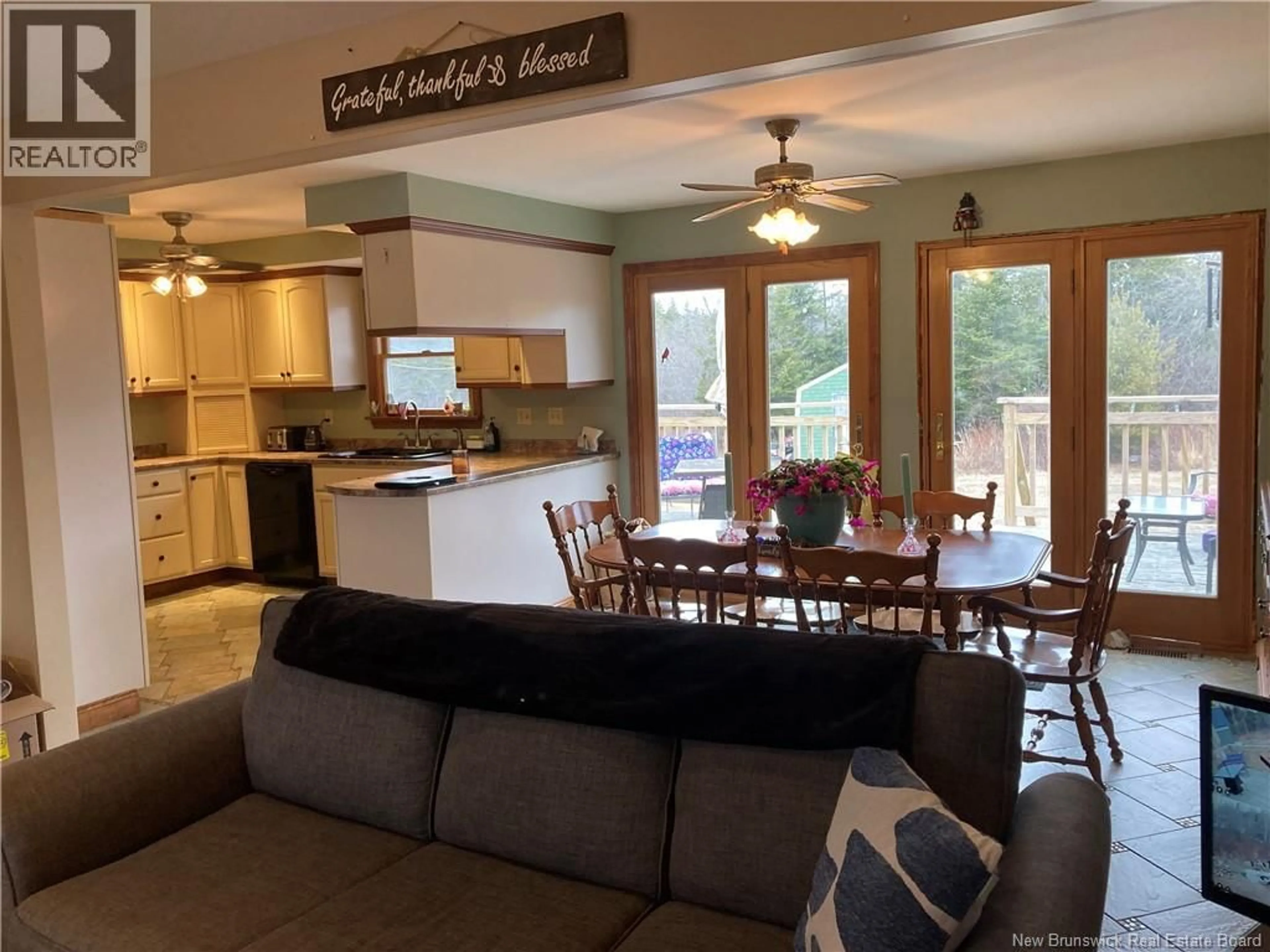 Open concept kitchen, wood/laminate floor for 2140 ROUTE 774, Wilsons Beach New Brunswick E5E1L2