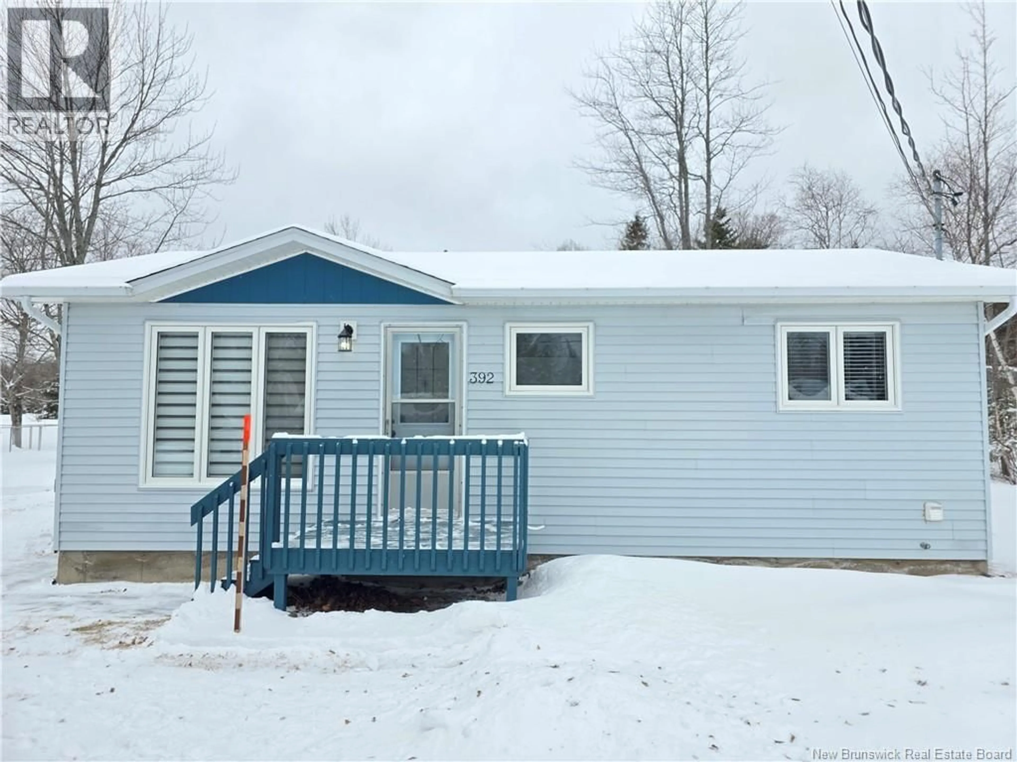 Home with vinyl exterior material, street for 392 RUE DES SAPINS, Nigadoo New Brunswick E8K3M4