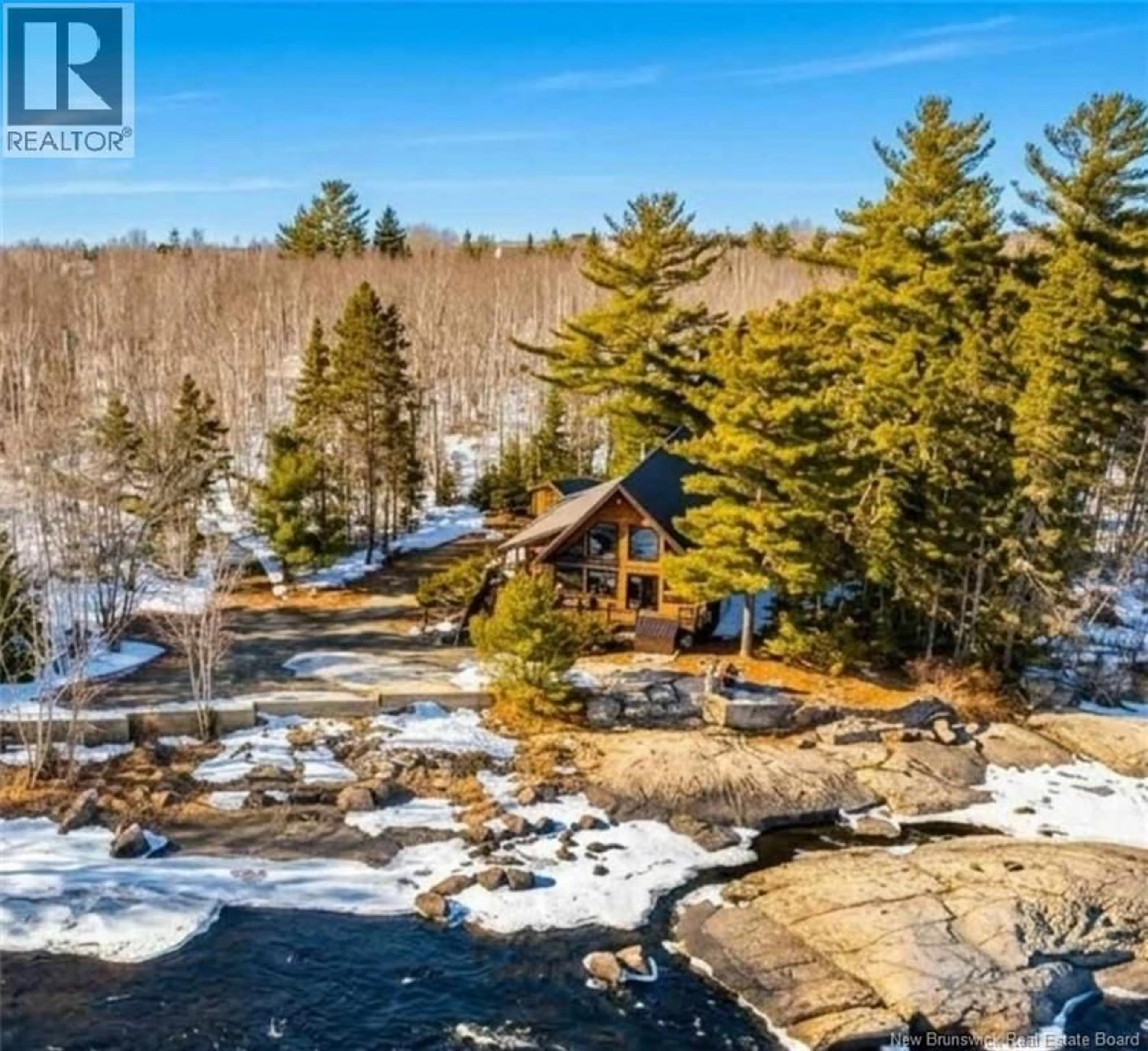A pic from outside/outdoor area/front of a property/back of a property/a pic from drone, water/lake/river/ocean view for 52 SHAMROCK VALLEY, Big River New Brunswick E2A7M1