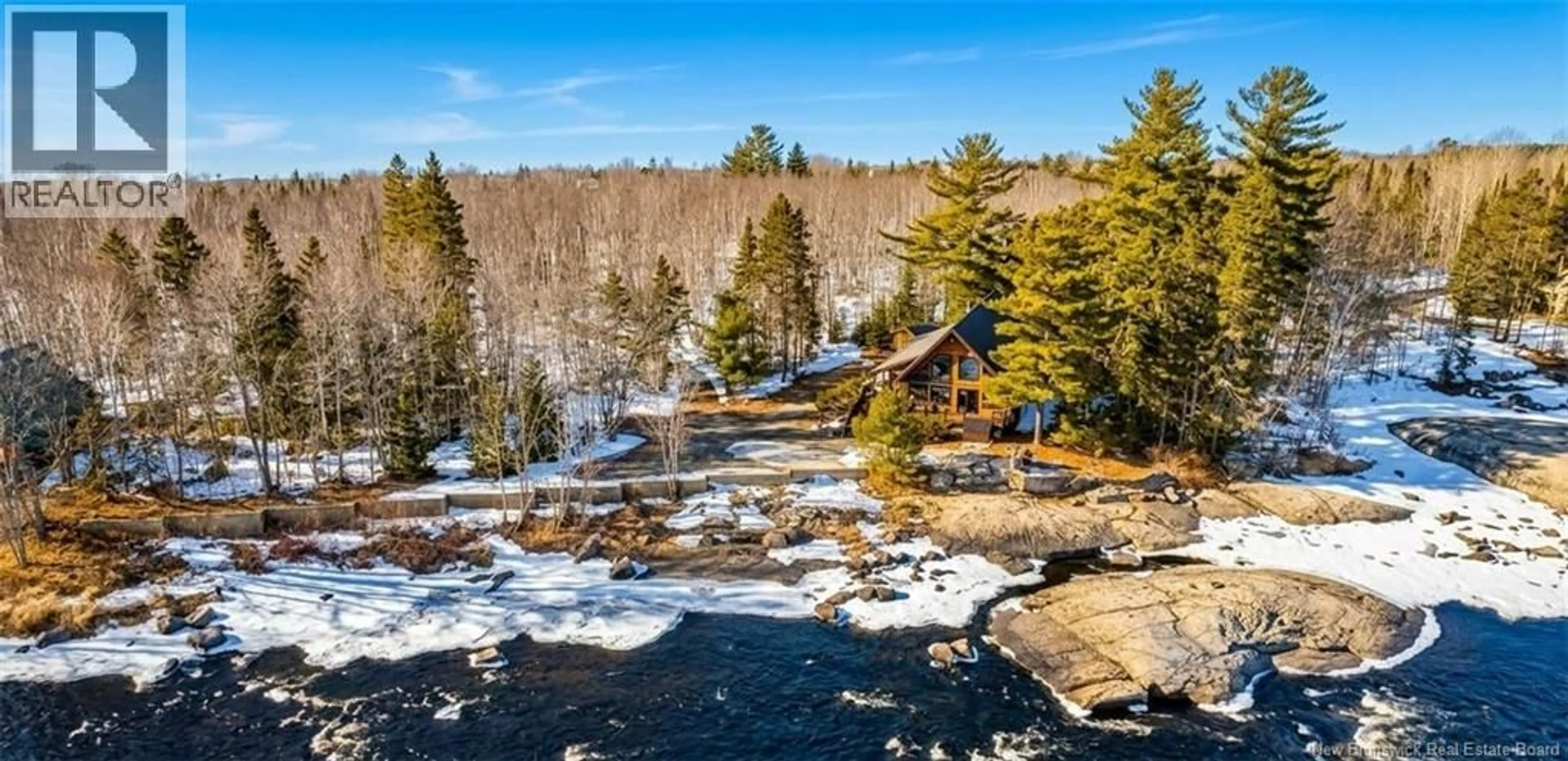 A pic from outside/outdoor area/front of a property/back of a property/a pic from drone, water/lake/river/ocean view for 52 SHAMROCK VALLEY, Big River New Brunswick E2A7M1