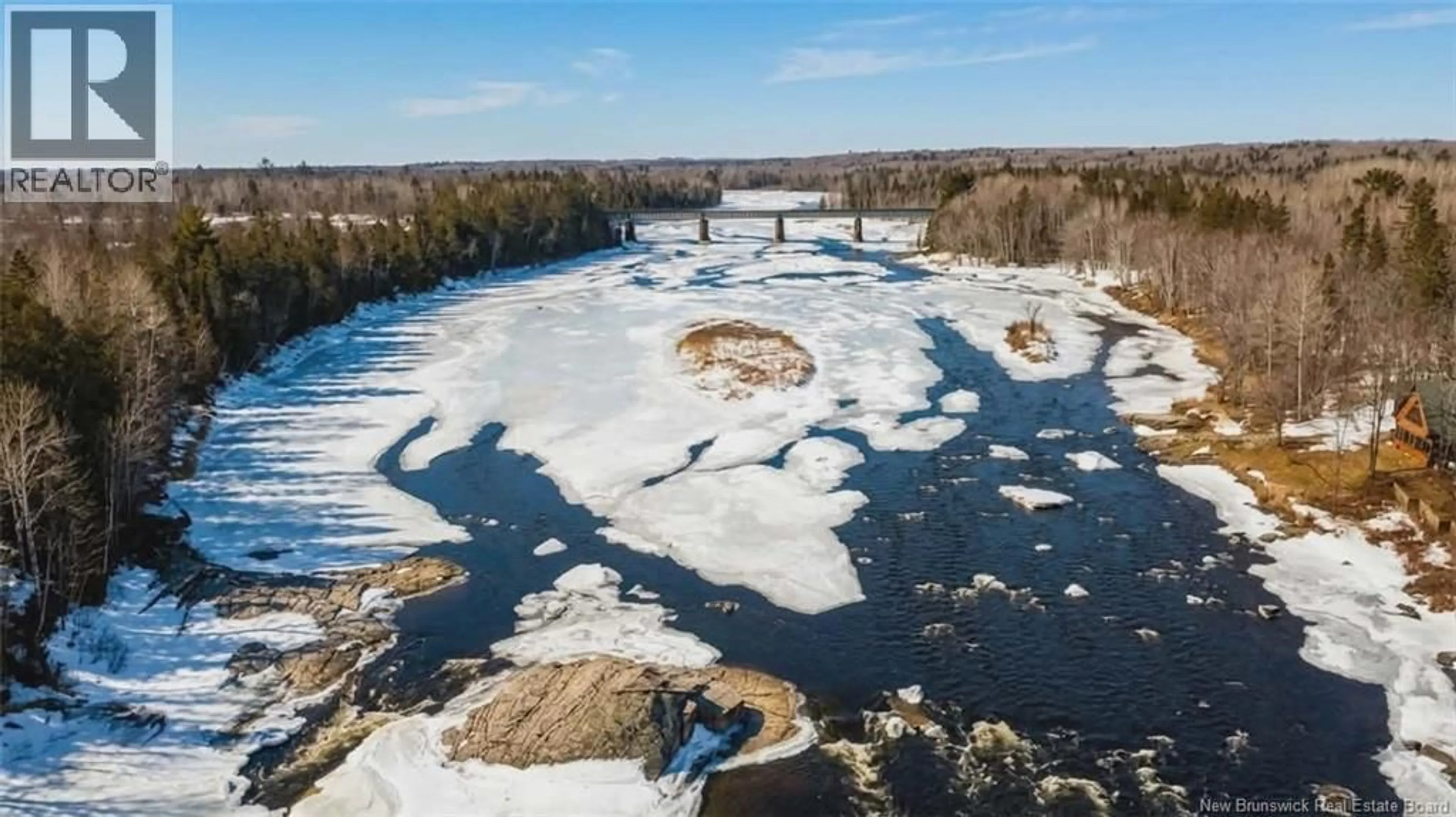 A pic from outside/outdoor area/front of a property/back of a property/a pic from drone, water/lake/river/ocean view for 52 SHAMROCK VALLEY, Big River New Brunswick E2A7M1