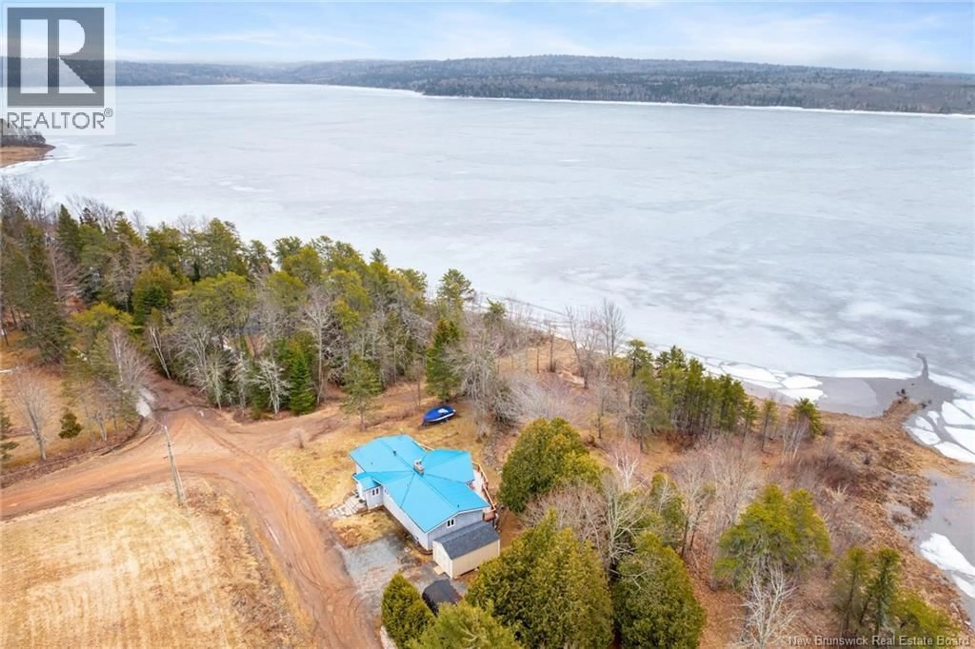 A pic from outside/outdoor area/front of a property/back of a property/a pic from drone, water/lake/river/ocean view for 93 WASHADEMOAK LANE, Cambridge-Narrows New Brunswick E4C1T8