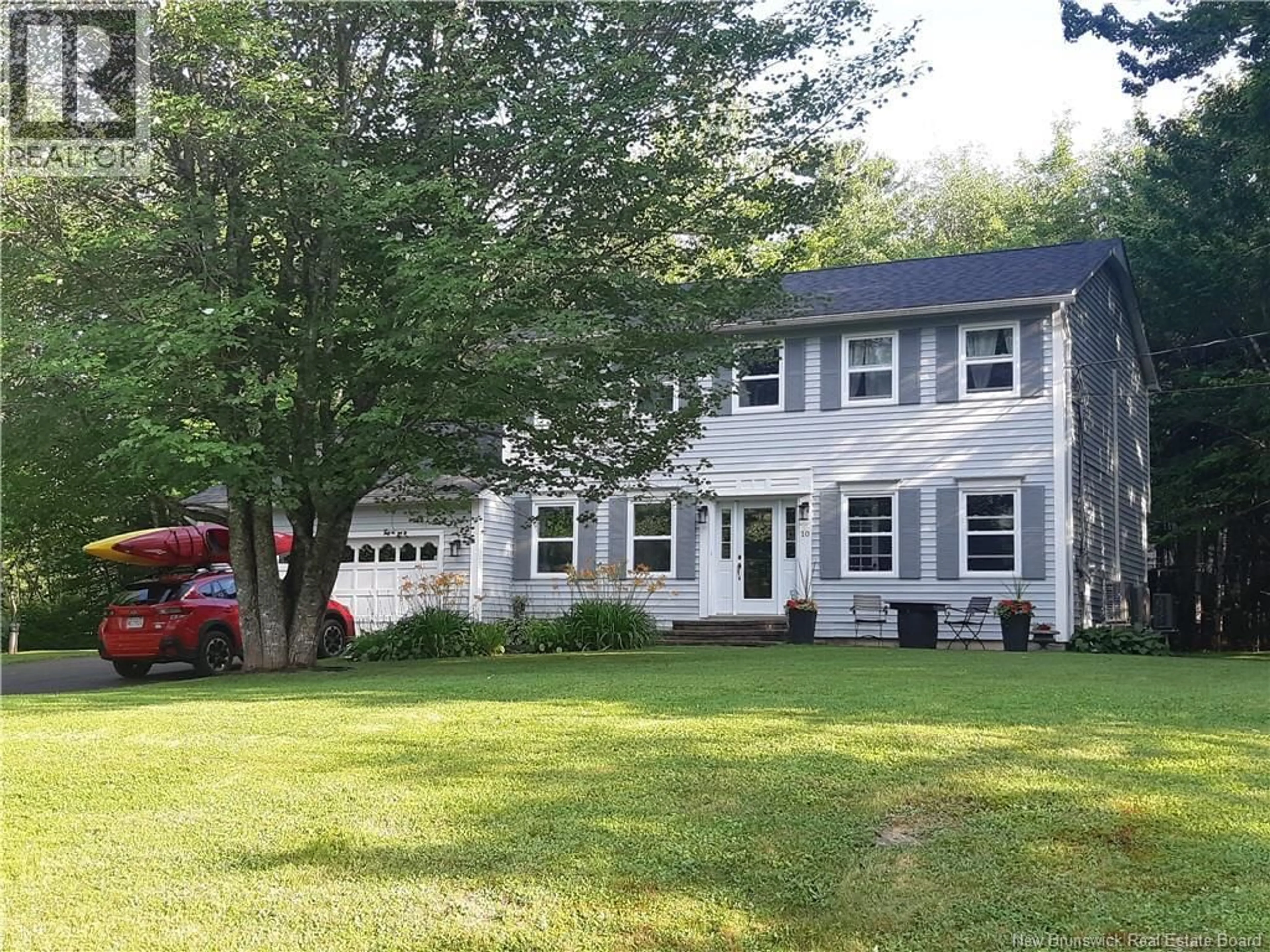 Home with vinyl exterior material, street for 10 LYNX LANE, Hanwell New Brunswick E3C1M9