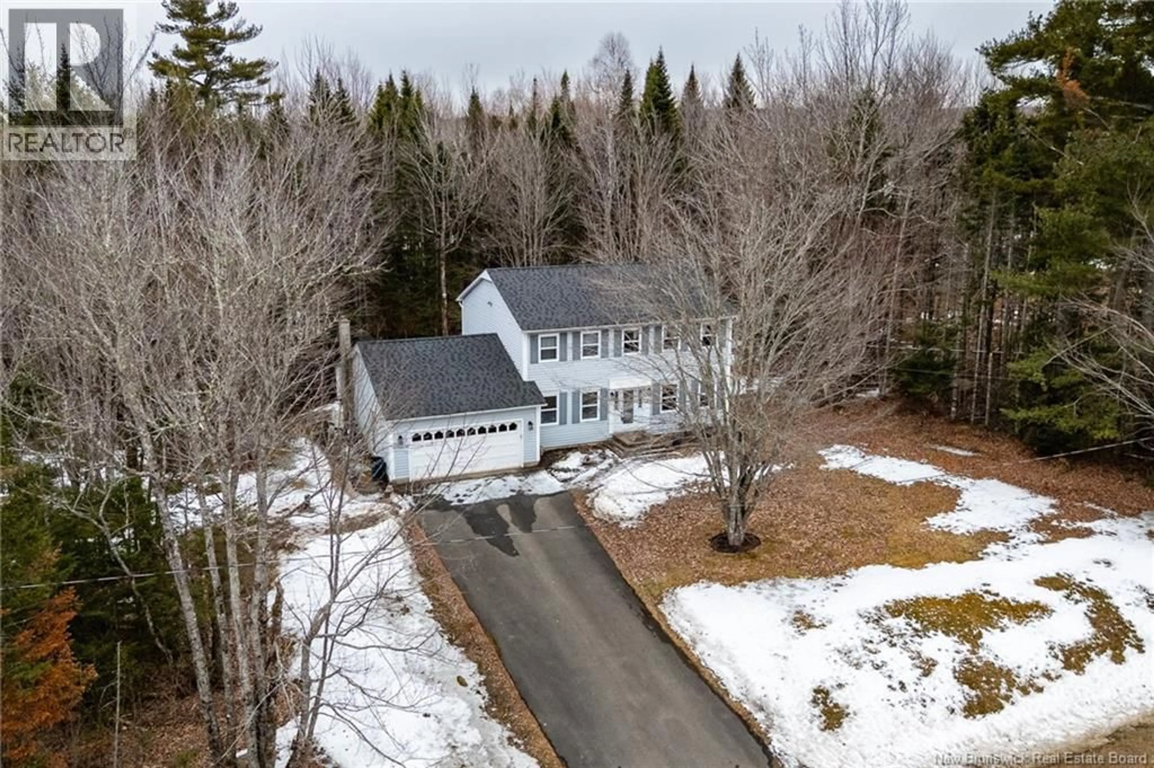 A pic from outside/outdoor area/front of a property/back of a property/a pic from drone, street for 10 LYNX LANE, Hanwell New Brunswick E3C1M9