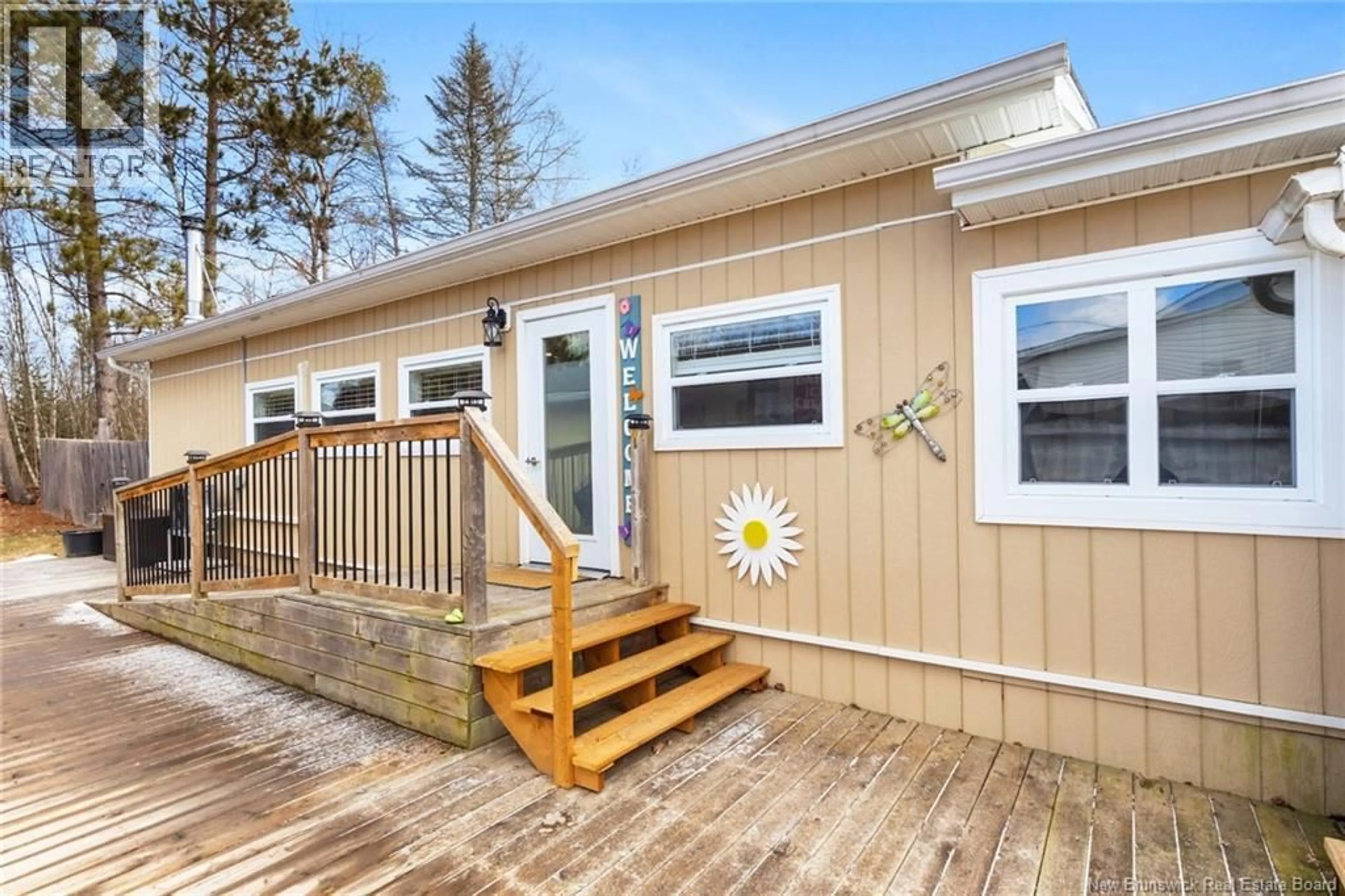 Home with vinyl exterior material, street for 20 CENTENNIAL DRIVE, Minto New Brunswick E4B3R9