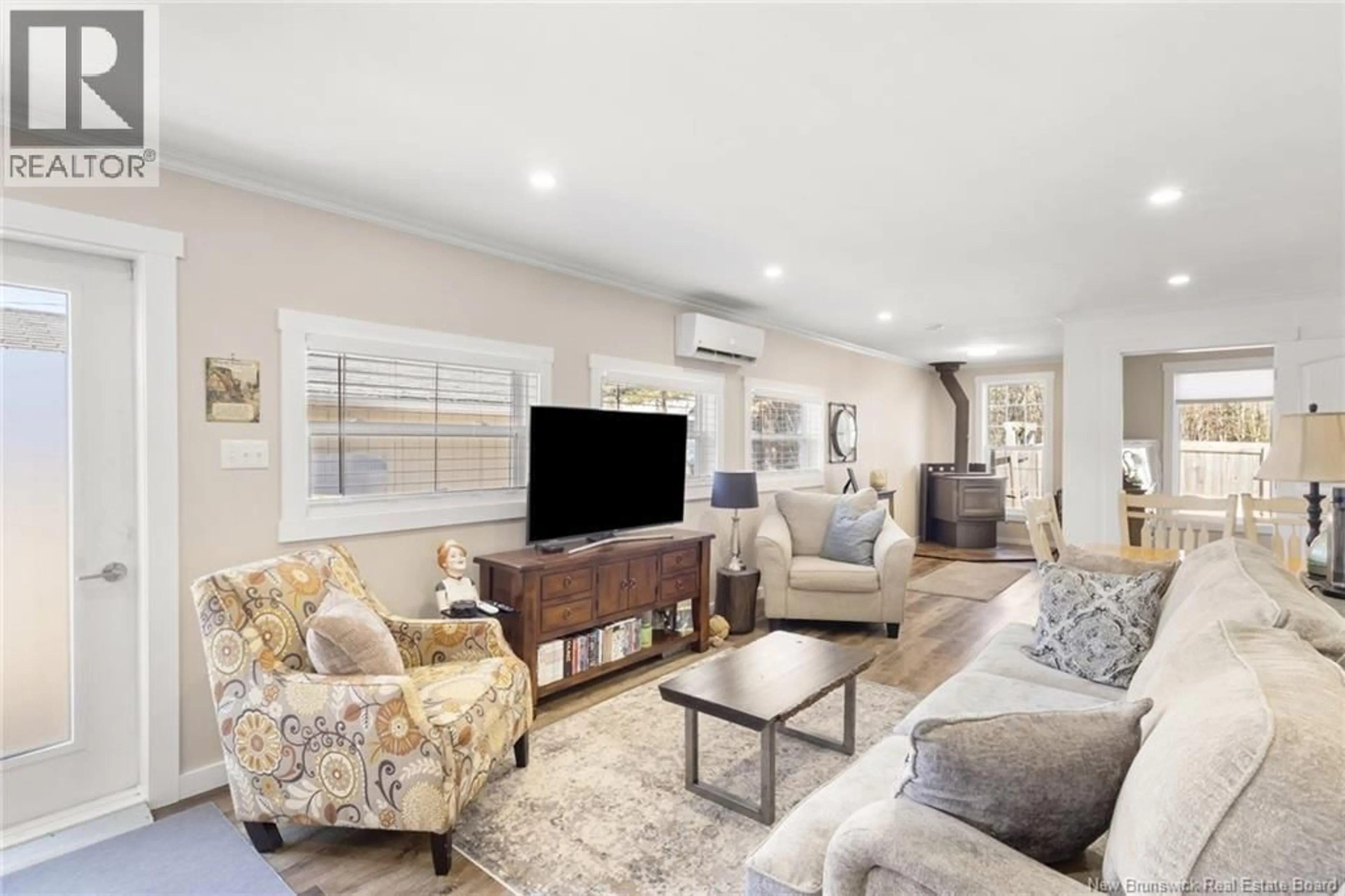 Living room with furniture, unknown for 20 CENTENNIAL DRIVE, Minto New Brunswick E4B3R9