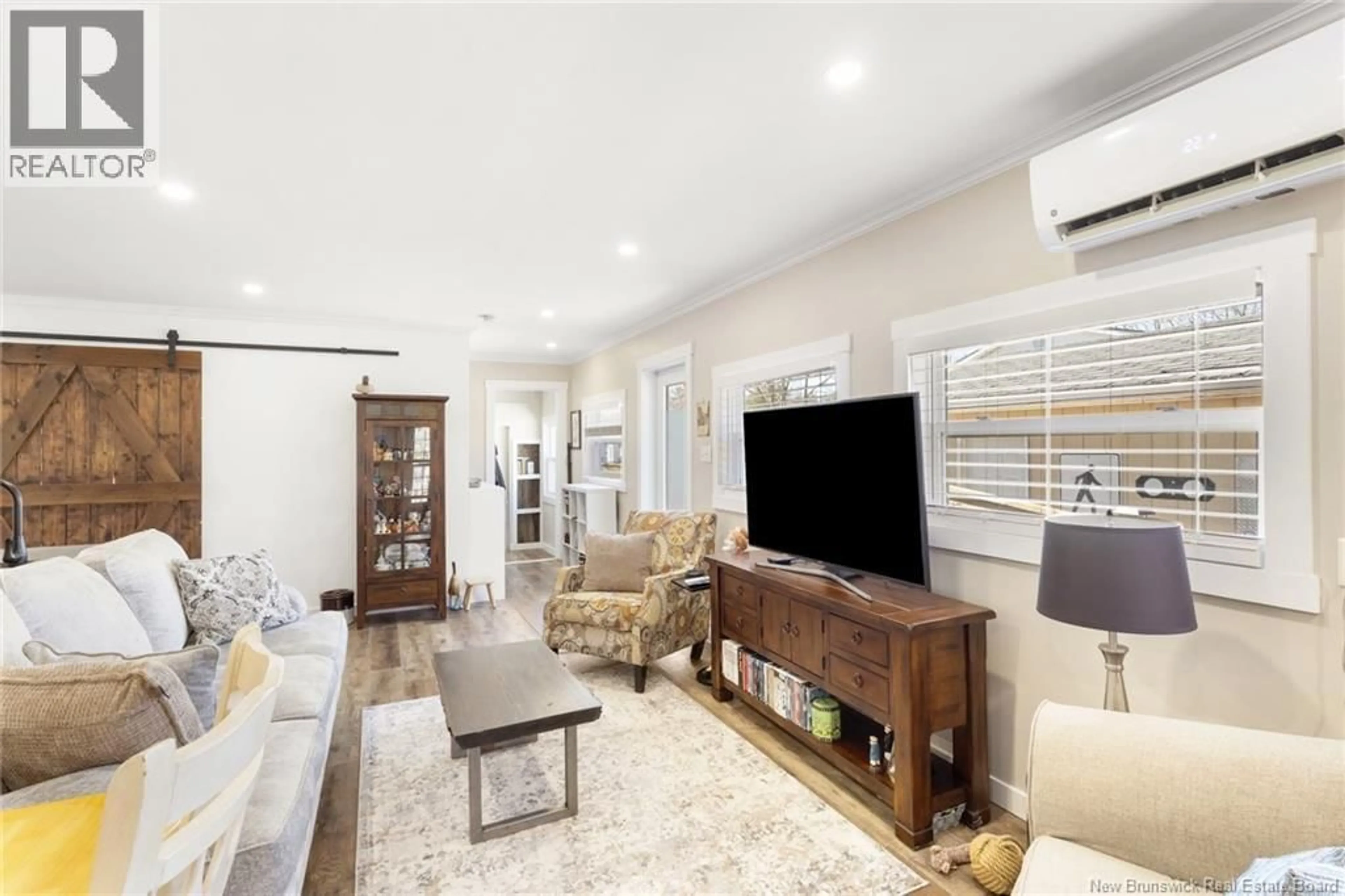 Living room with furniture, unknown for 20 CENTENNIAL DRIVE, Minto New Brunswick E4B3R9