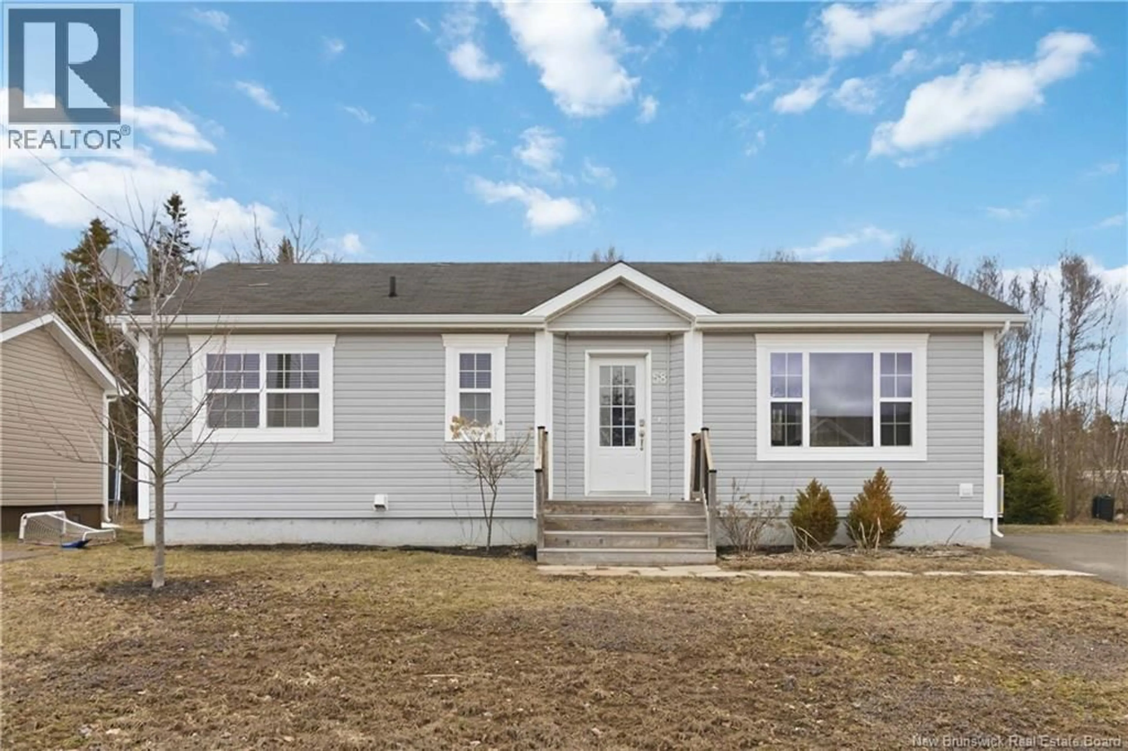 Home with vinyl exterior material, street for 58 WILFRED, Dieppe New Brunswick E1A0E4
