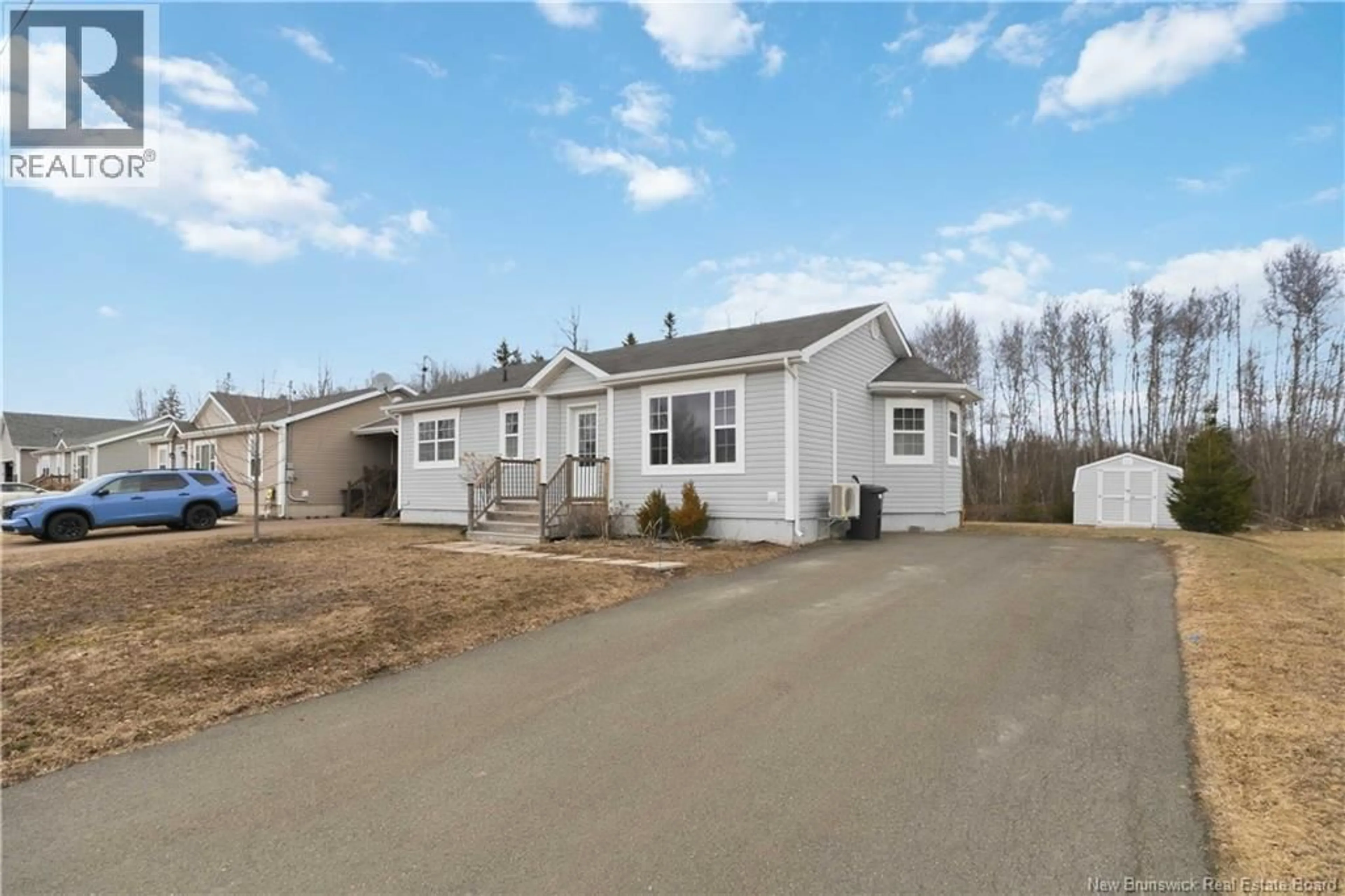 Home with vinyl exterior material, street for 58 WILFRED, Dieppe New Brunswick E1A0E4