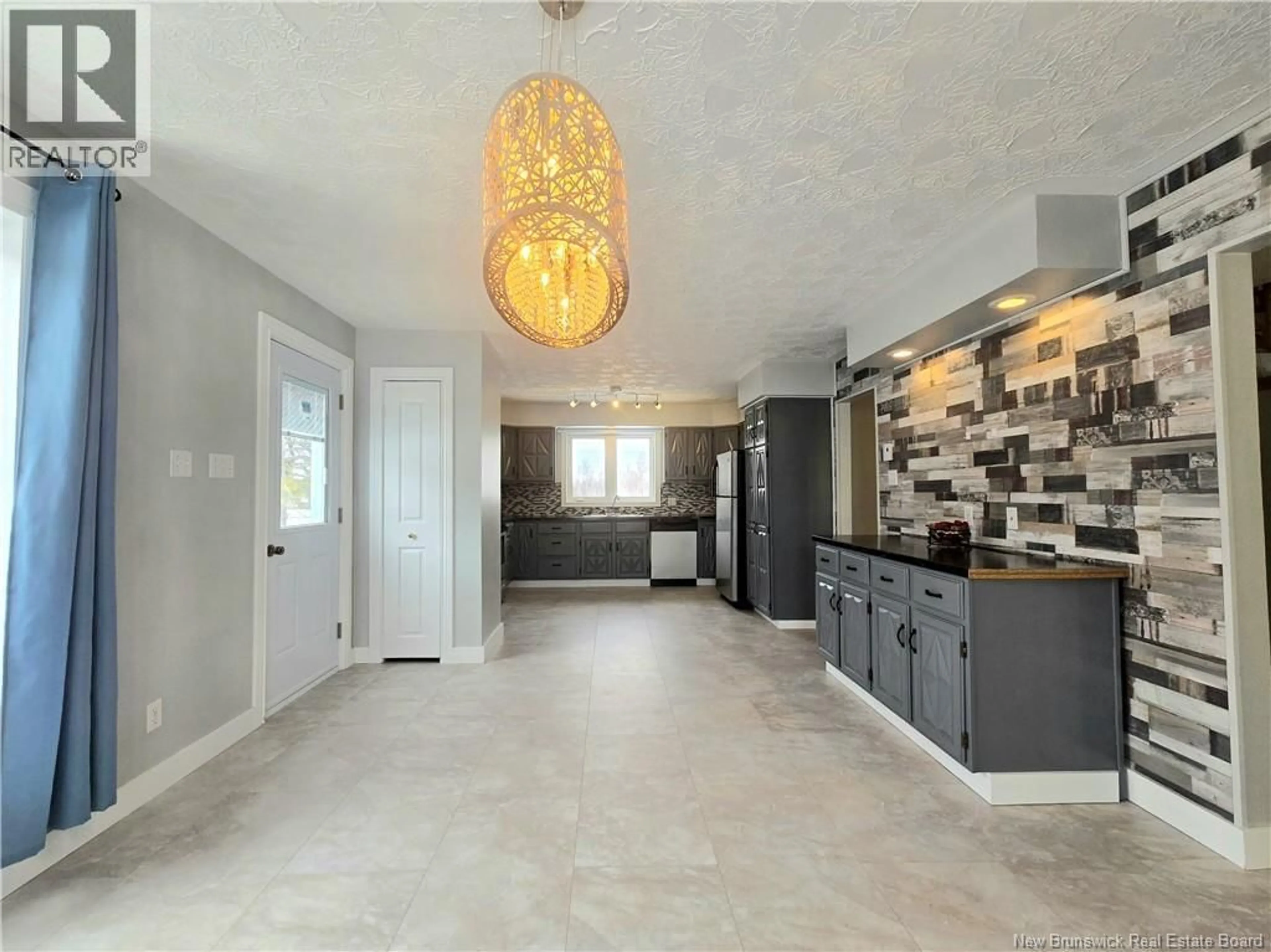 Open concept kitchen, ceramic/tile floor for 5551 ROUTE 11, Brantville New Brunswick E9H1W3