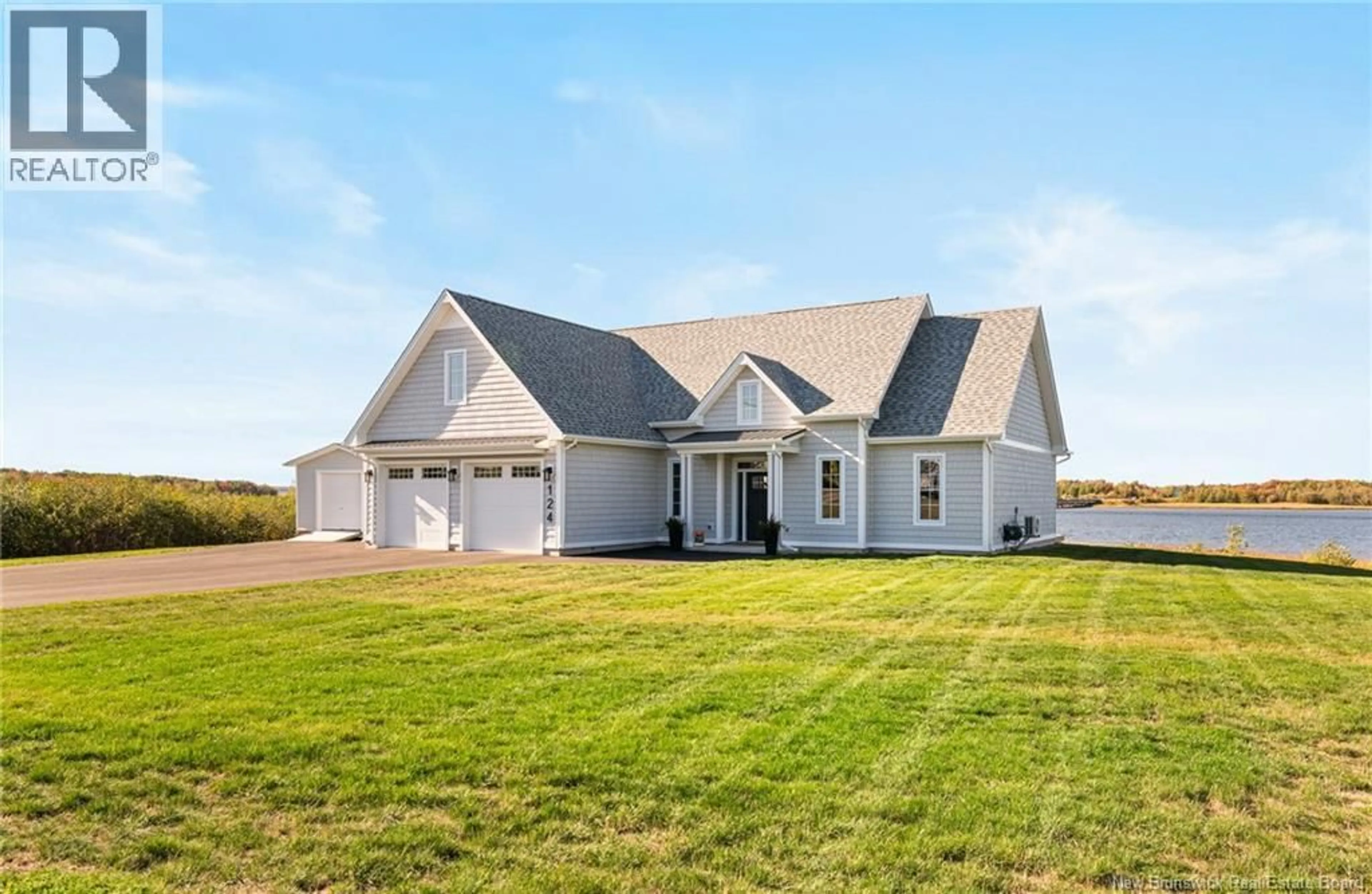 Home with vinyl exterior material, building for 124 RIVE SUD, Cocagne New Brunswick E4R2W9