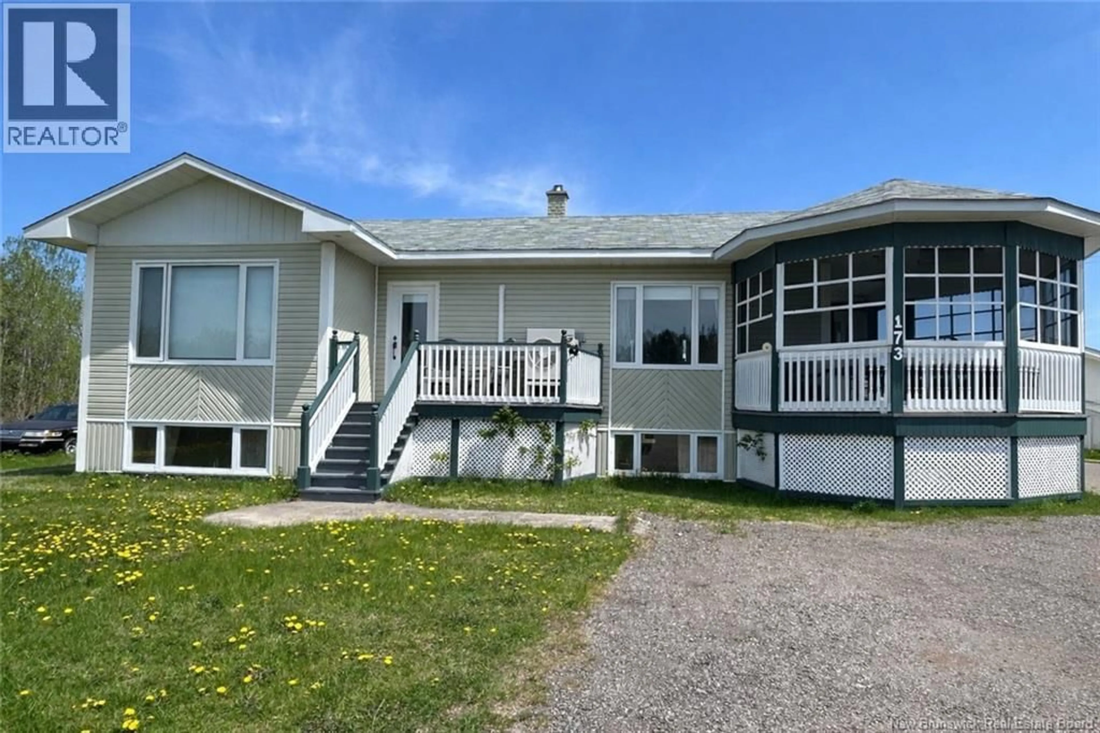 Home with vinyl exterior material, street for 173 LEBOUTHILLIER ROAD, Saint-Simon New Brunswick E8P1Z4