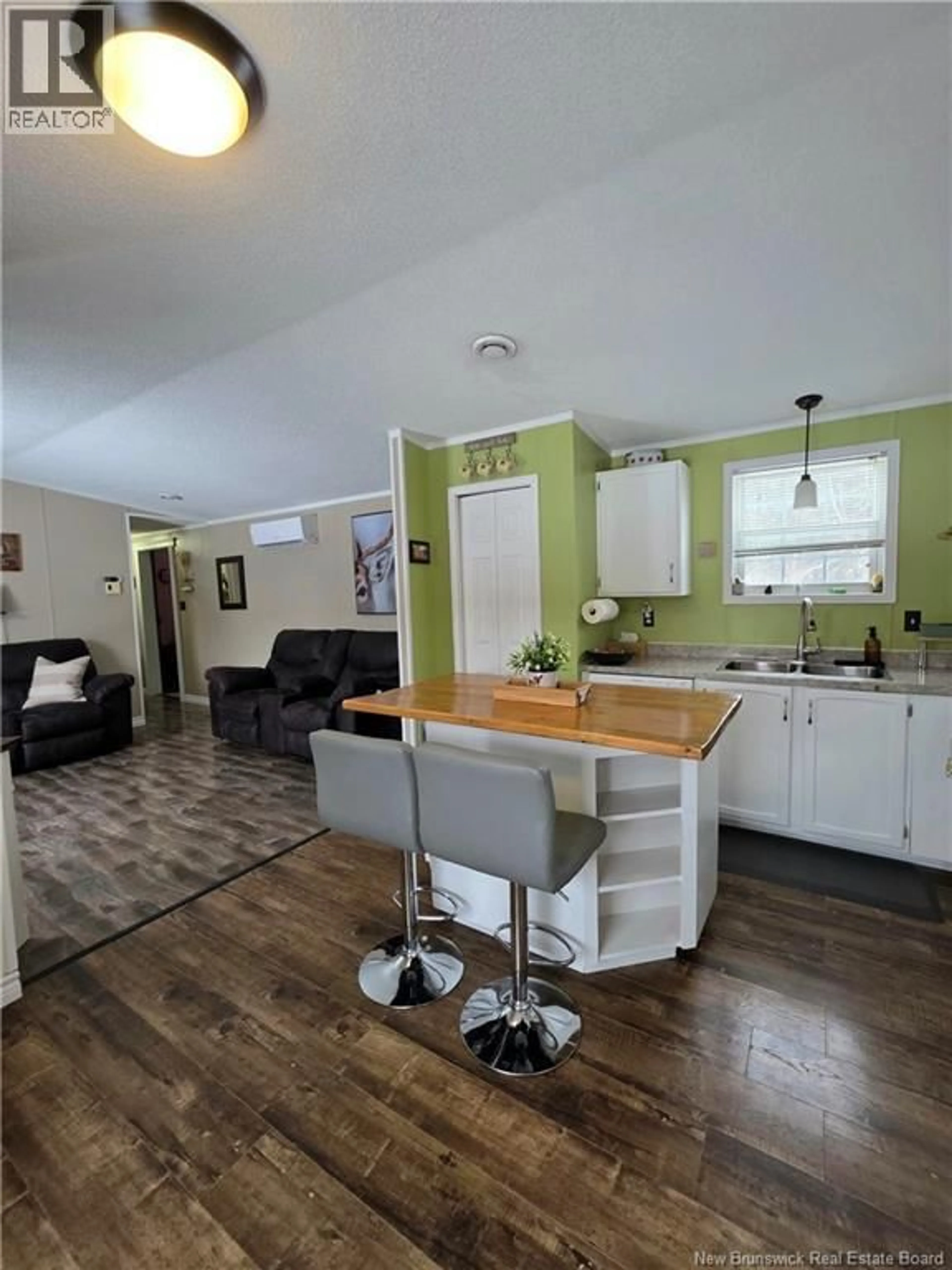 Open concept kitchen, wood/laminate floor for 3091 ROUTE 115, Notre-Dame New Brunswick E4V2C3