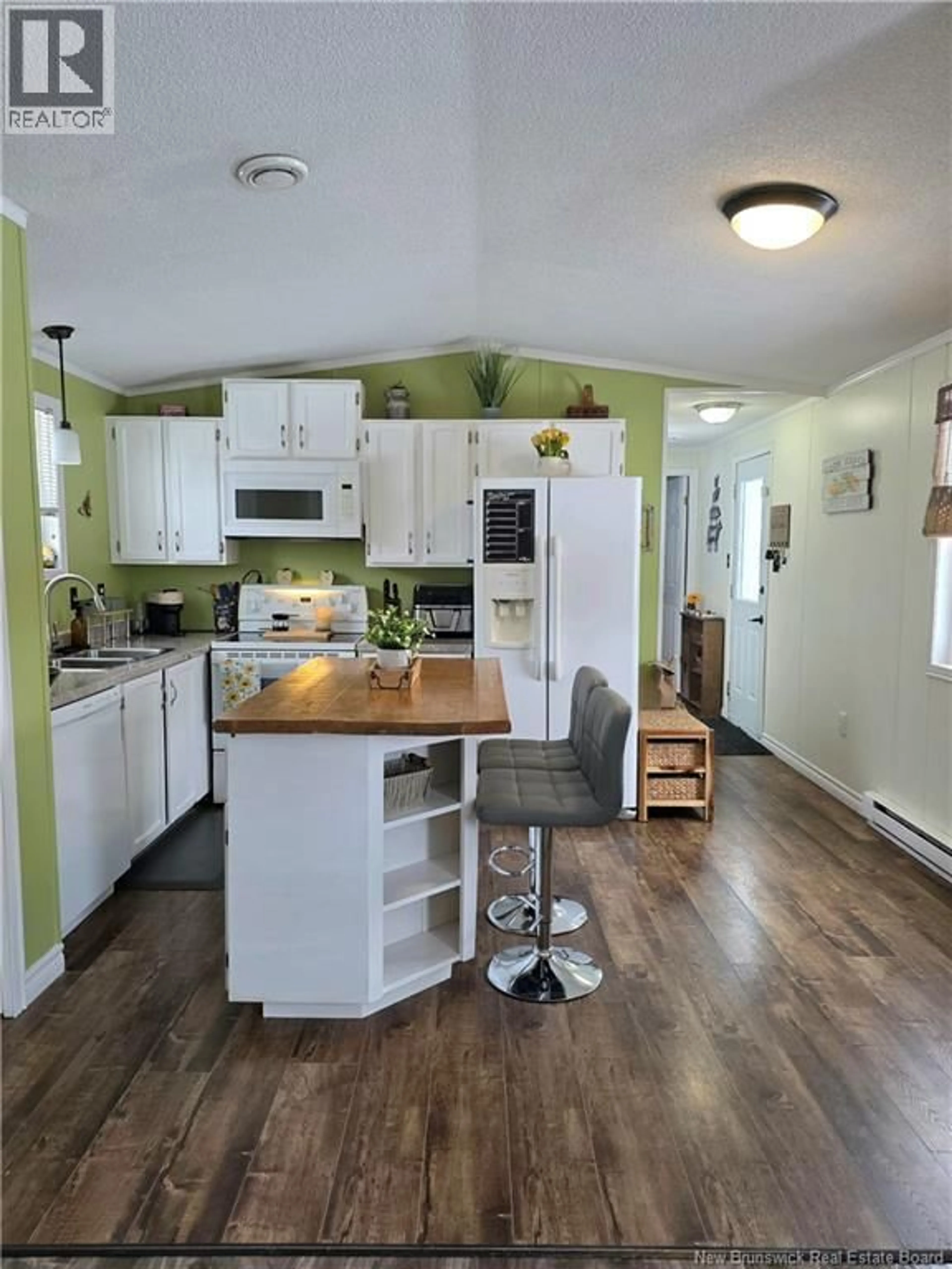 Open concept kitchen, wood/laminate floor for 3091 ROUTE 115, Notre-Dame New Brunswick E4V2C3