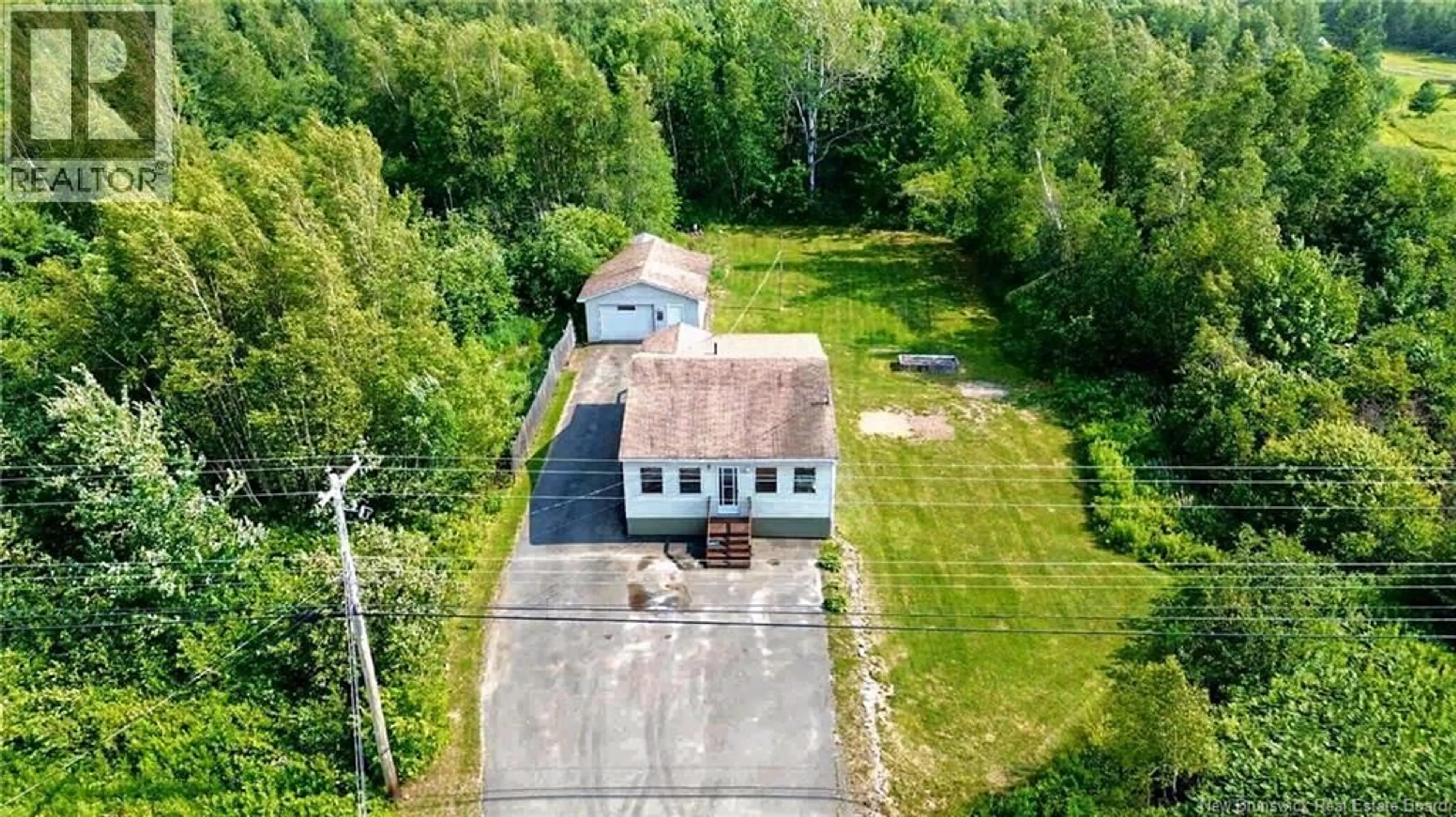 A pic from outside/outdoor area/front of a property/back of a property/a pic from drone, building for 4927 ROUTE 480 ROUTE, Acadieville New Brunswick E4Y2C5