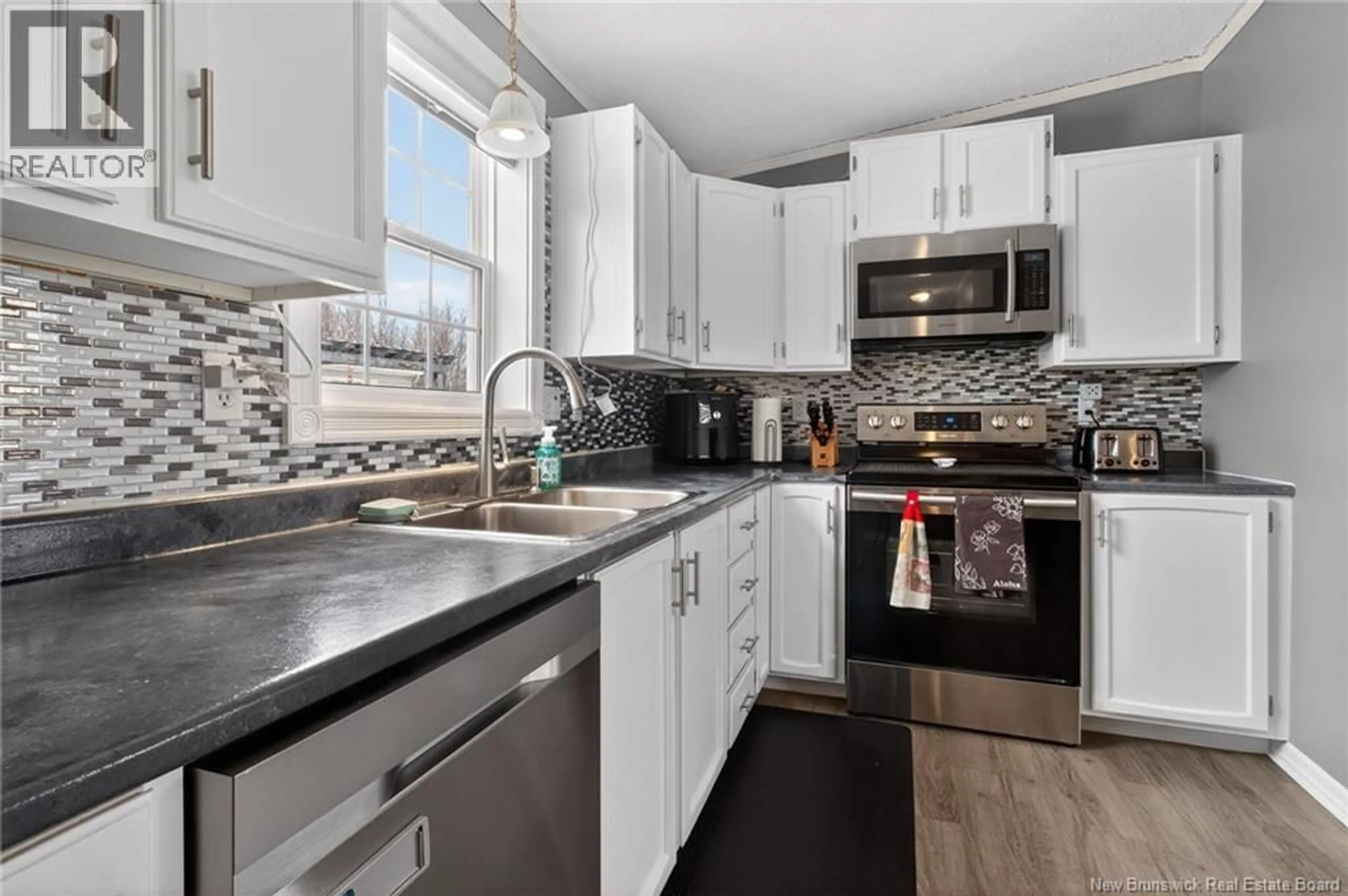 Open concept kitchen, unknown for 74 ULYSSE, Dieppe New Brunswick E1A7C1