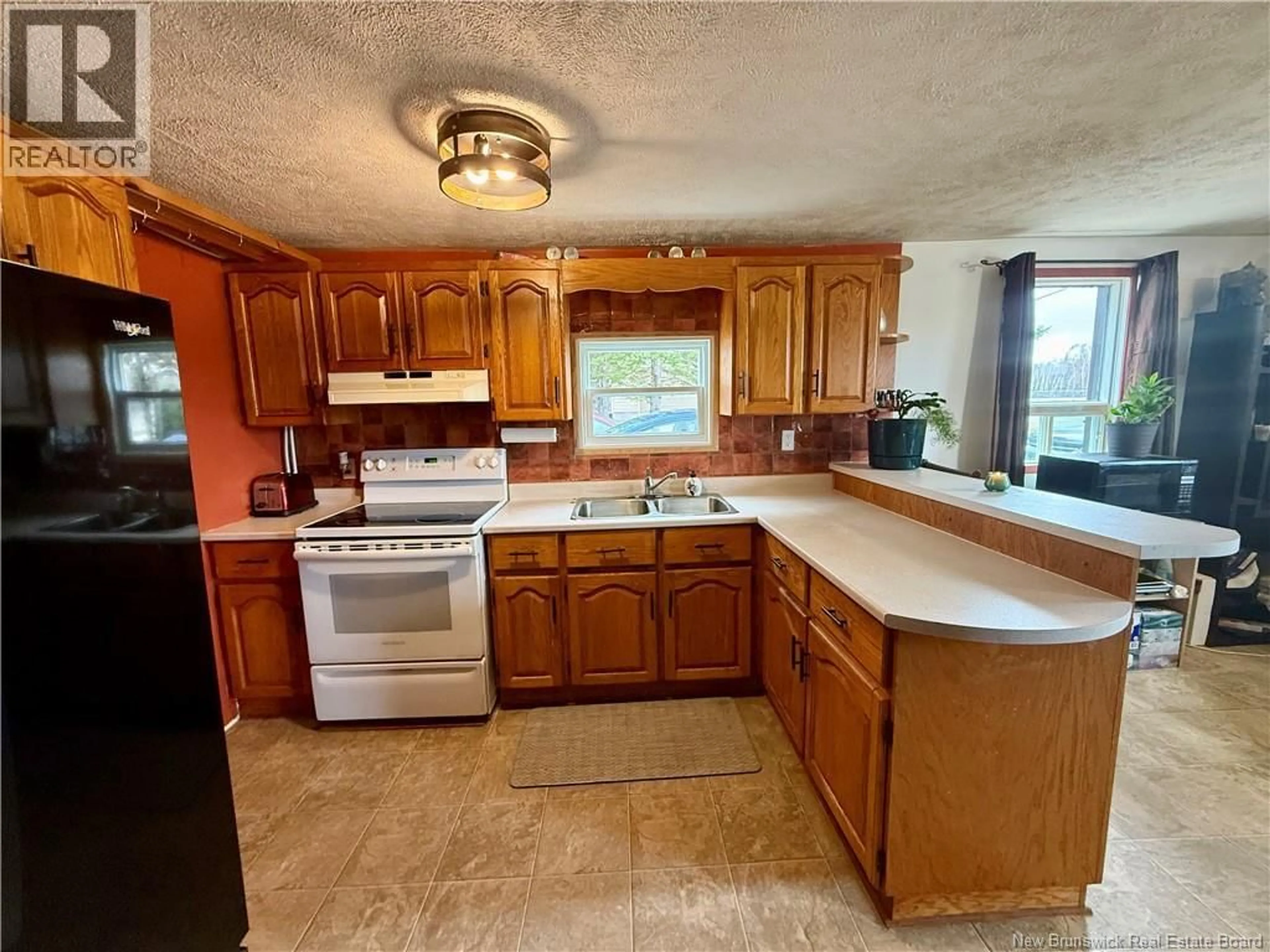 Standard kitchen, ceramic/tile floor for 74 DE L'ECOLE STREET, Rogersville New Brunswick E4Y1V7