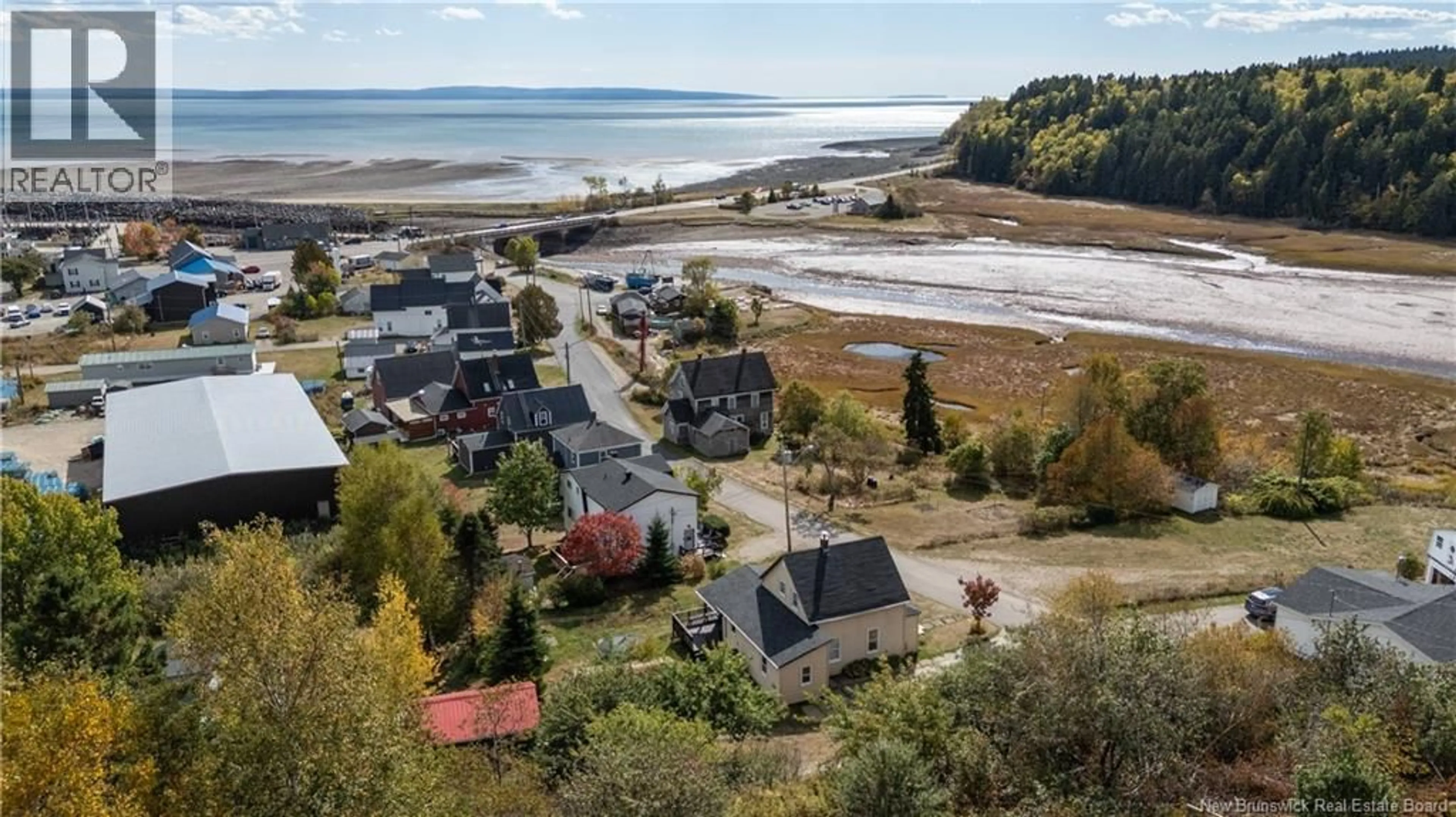 A pic from outside/outdoor area/front of a property/back of a property/a pic from drone, water/lake/river/ocean view for 52 FUNDY VIEW DRIVE, Alma New Brunswick E4H1H7
