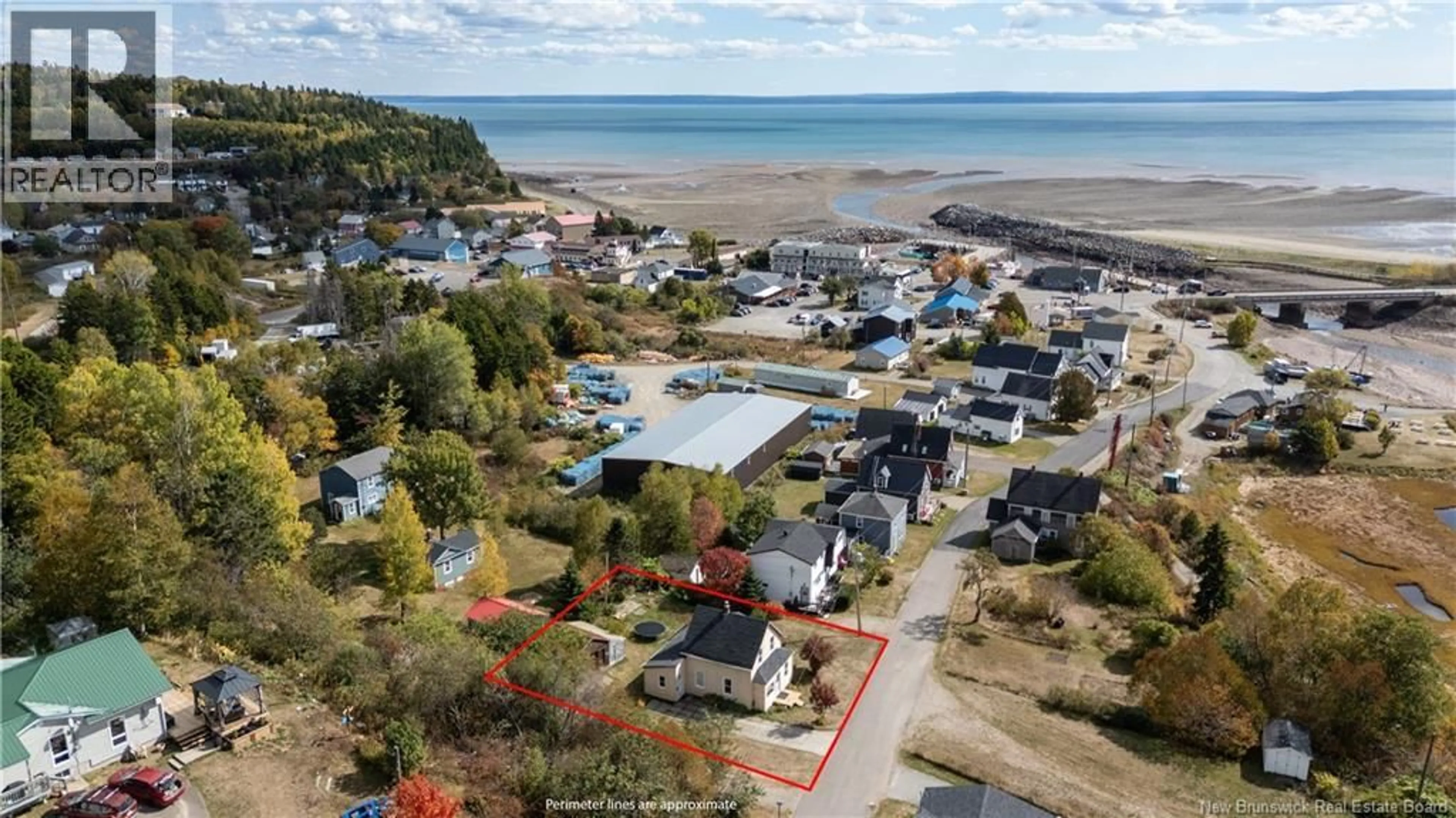 A pic from outside/outdoor area/front of a property/back of a property/a pic from drone, water/lake/river/ocean view for 52 FUNDY VIEW DRIVE, Alma New Brunswick E4H1H7