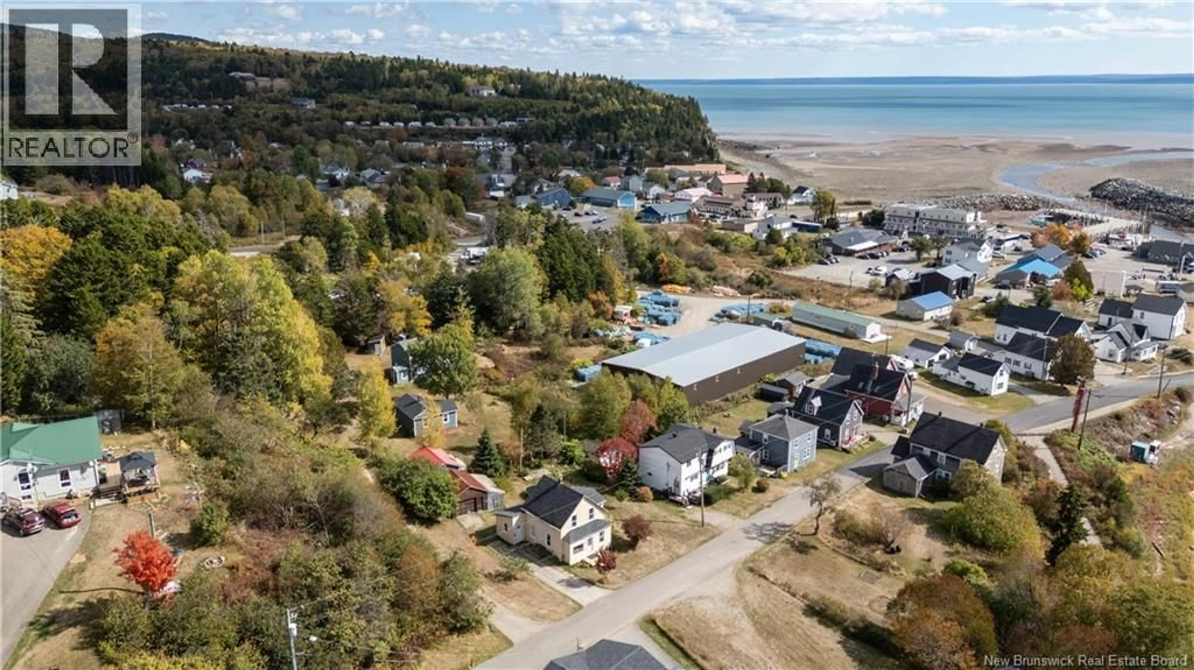 A pic from outside/outdoor area/front of a property/back of a property/a pic from drone, water/lake/river/ocean view for 52 FUNDY VIEW DRIVE, Alma New Brunswick E4H1H7