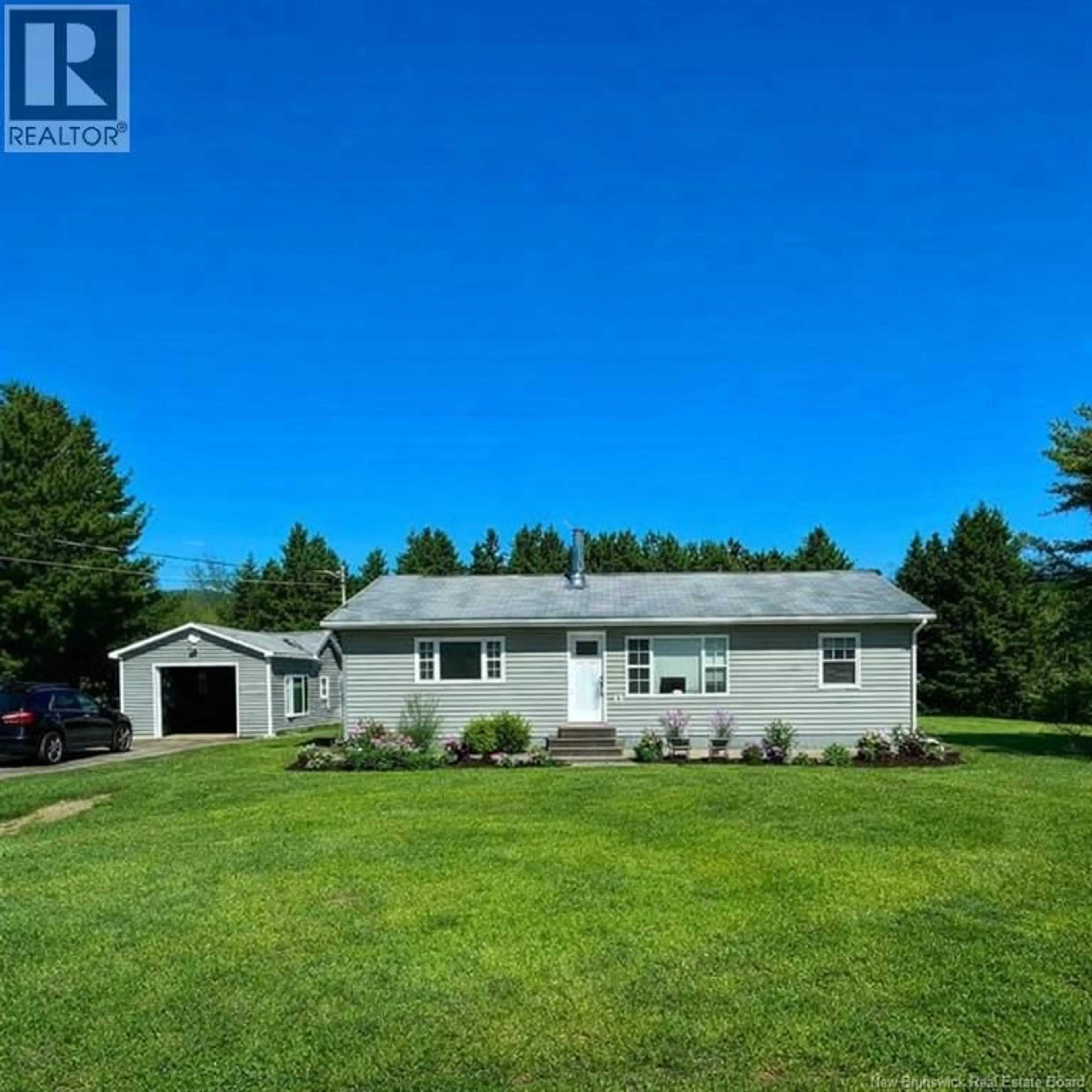 A pic from outside/outdoor area/front of a property/back of a property/a pic from drone, water/lake/river/ocean view for 23 ANGUS DRIVE, Grand-Barachois New Brunswick E4P8V9
