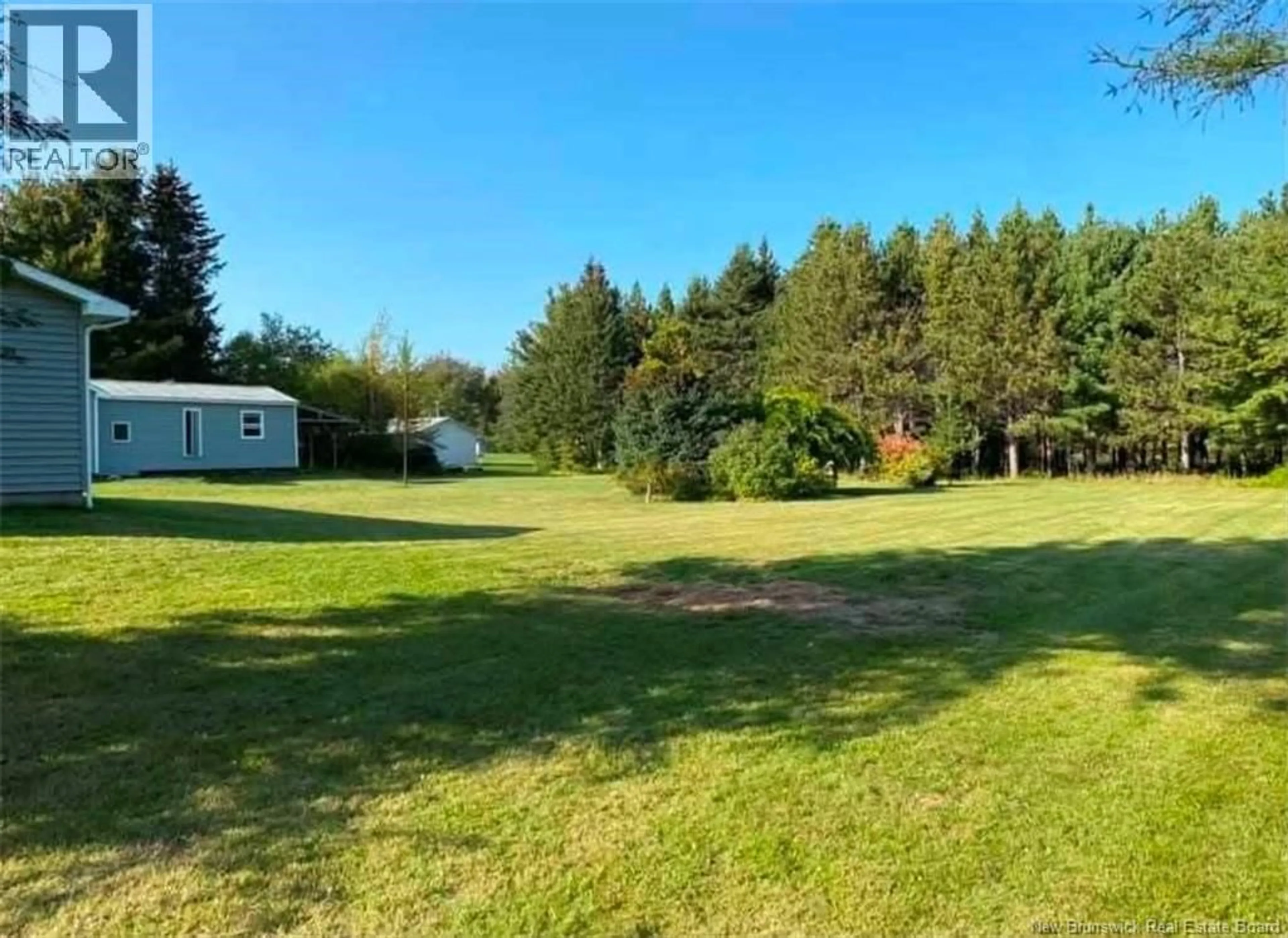 A pic from outside/outdoor area/front of a property/back of a property/a pic from drone, forest/trees view for 23 ANGUS DRIVE, Grand-Barachois New Brunswick E4P8V9