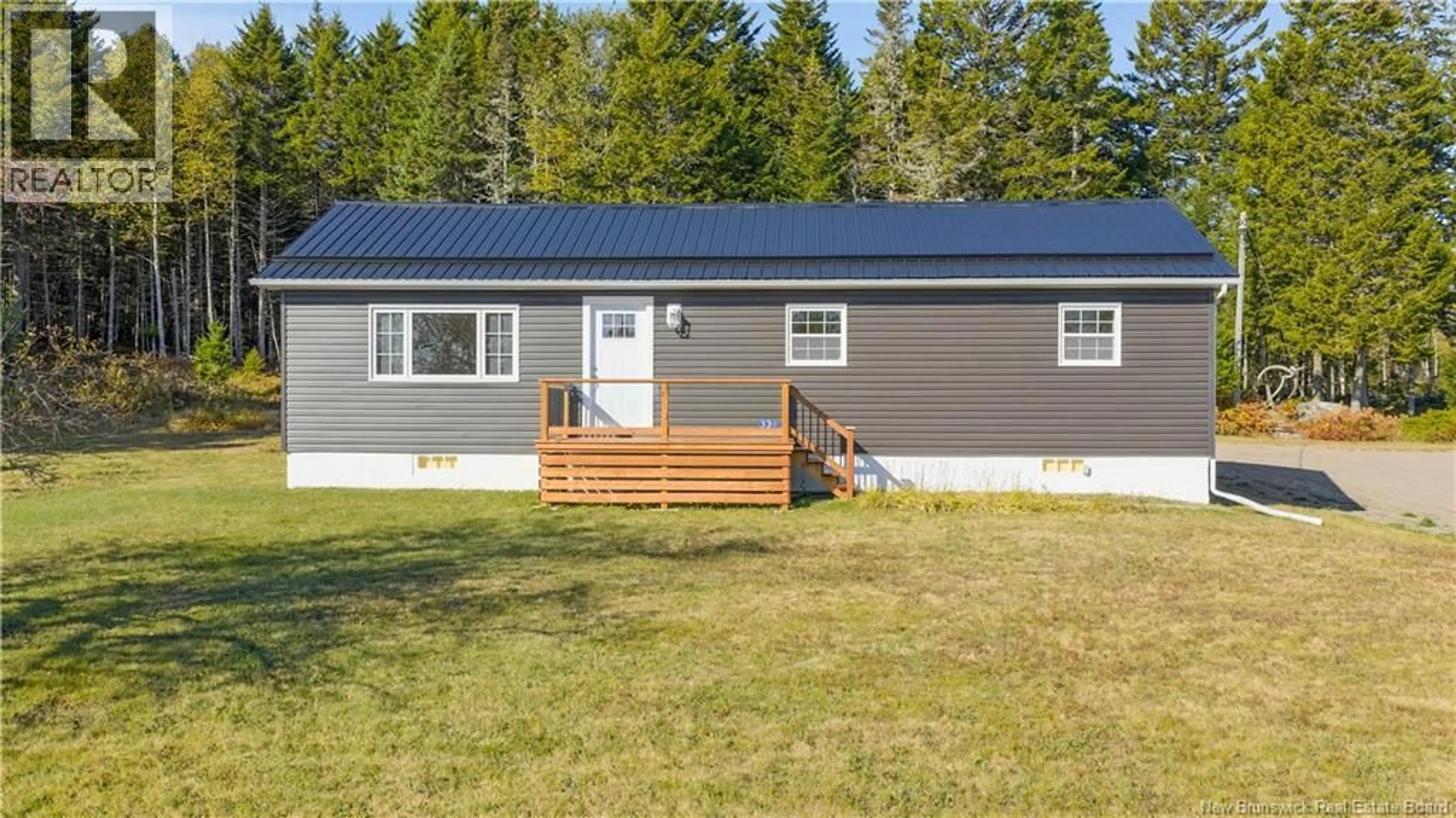 Home with vinyl exterior material, street for 338 ROUTE 176, Pennfield New Brunswick E5H2L6