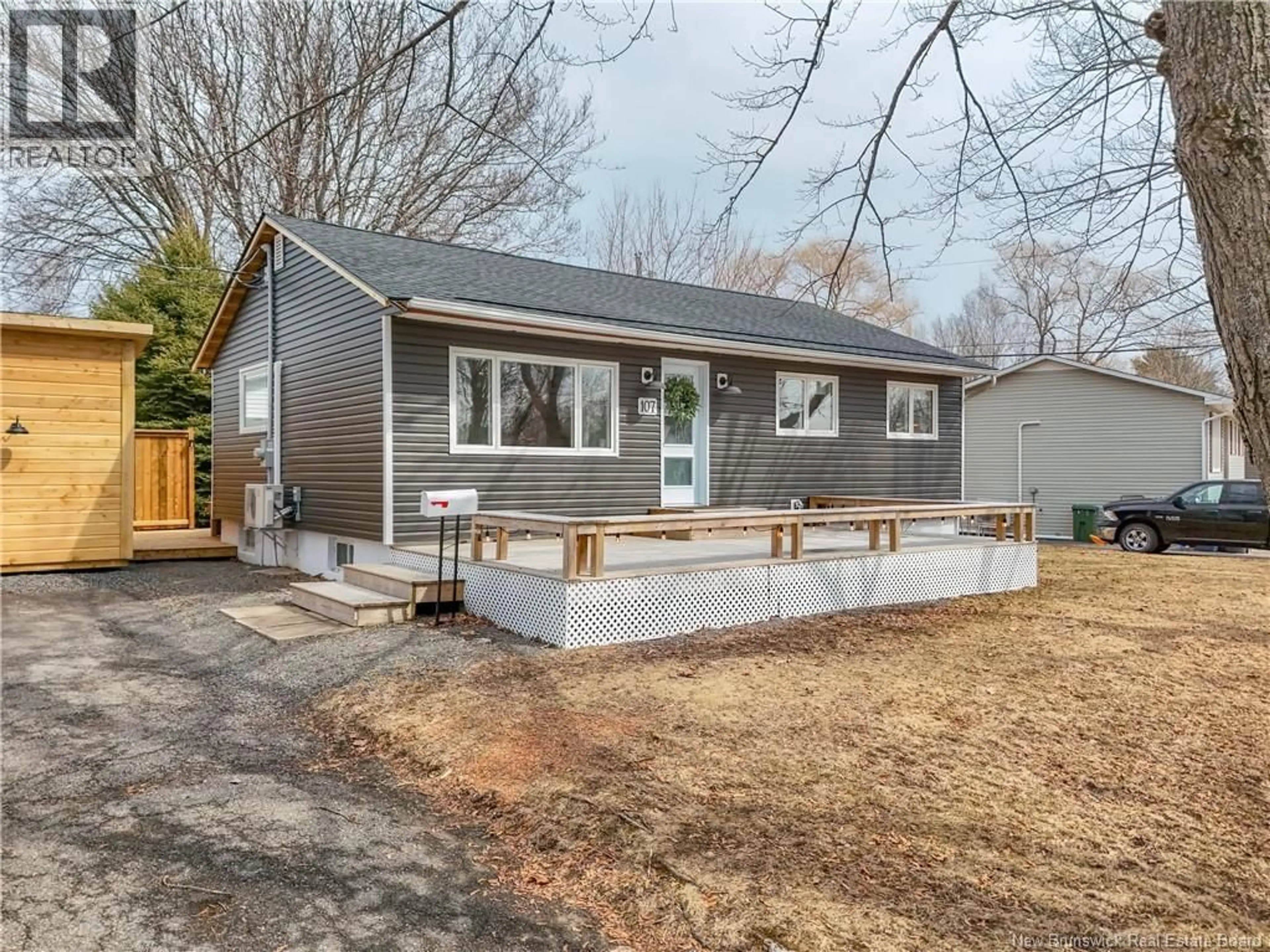 Home with vinyl exterior material, street for 107 TEAK DRIVE, Fredericton New Brunswick E3A2J2