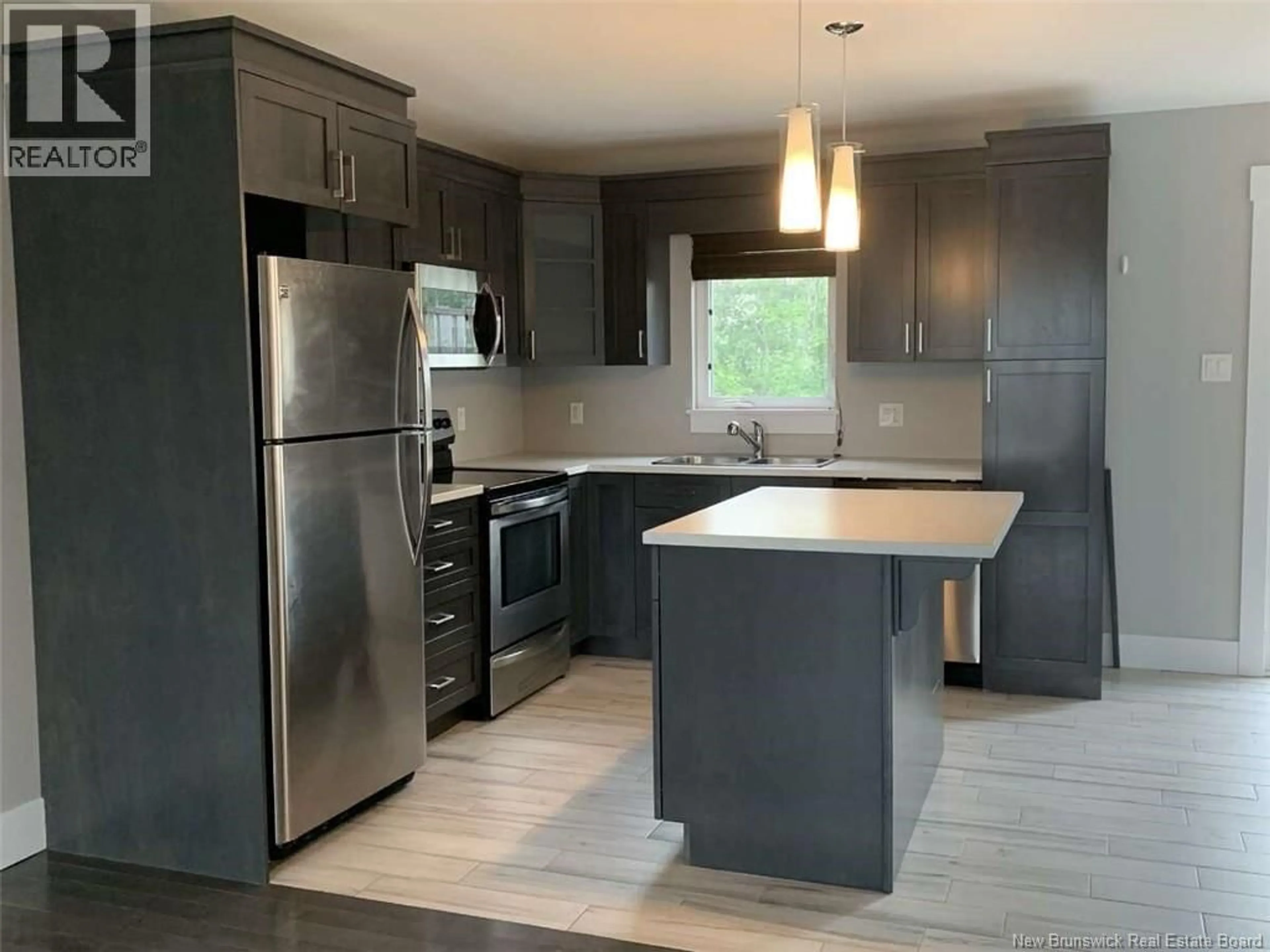 Open concept kitchen, unknown for 98 LANCEFIELD CRESCENT, Moncton New Brunswick E1E0E6