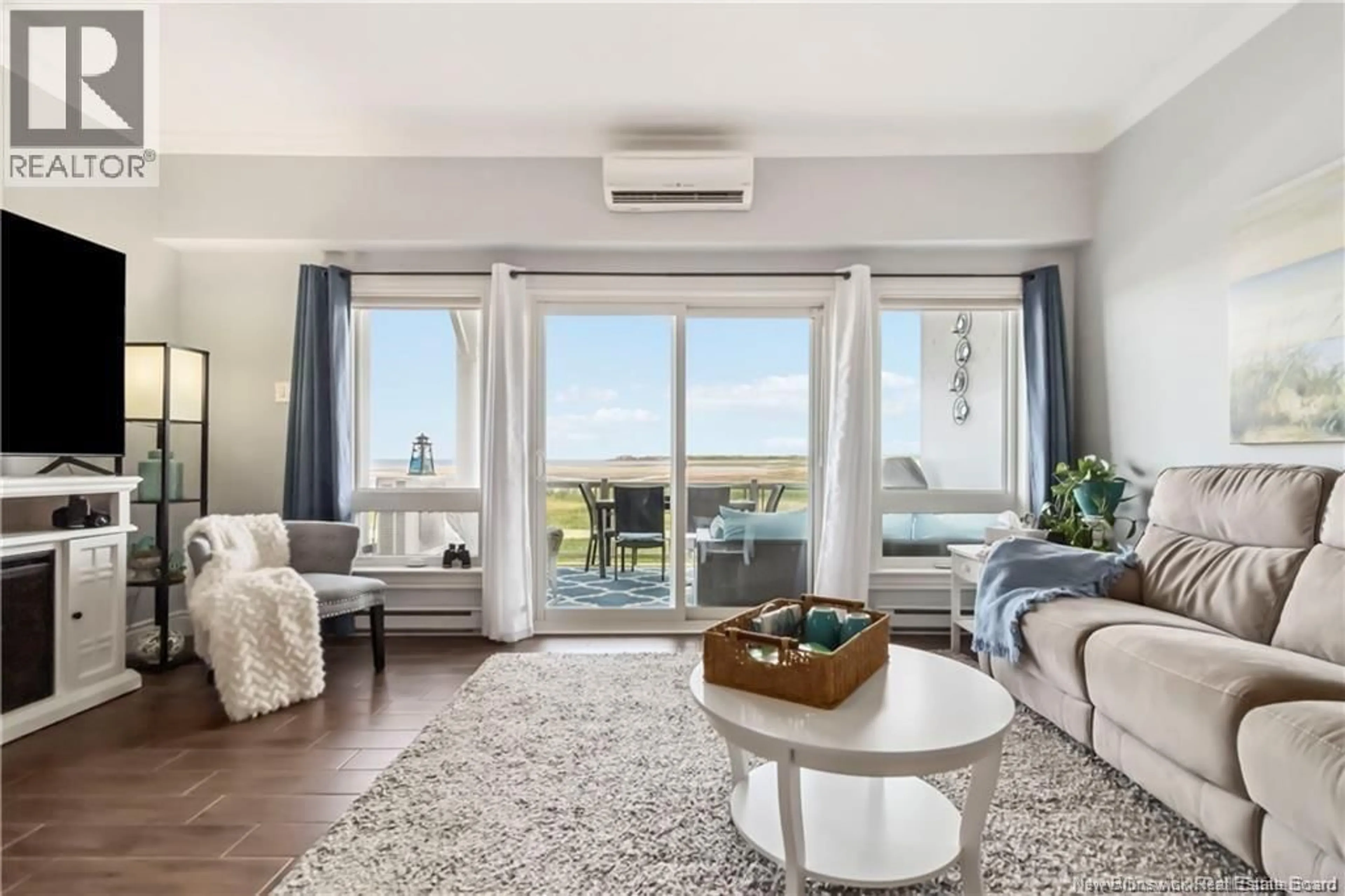 Living room with furniture, unknown for 105 - 69 CAP BIMET BOULEVARD, Barachois New Brunswick E4P6X5