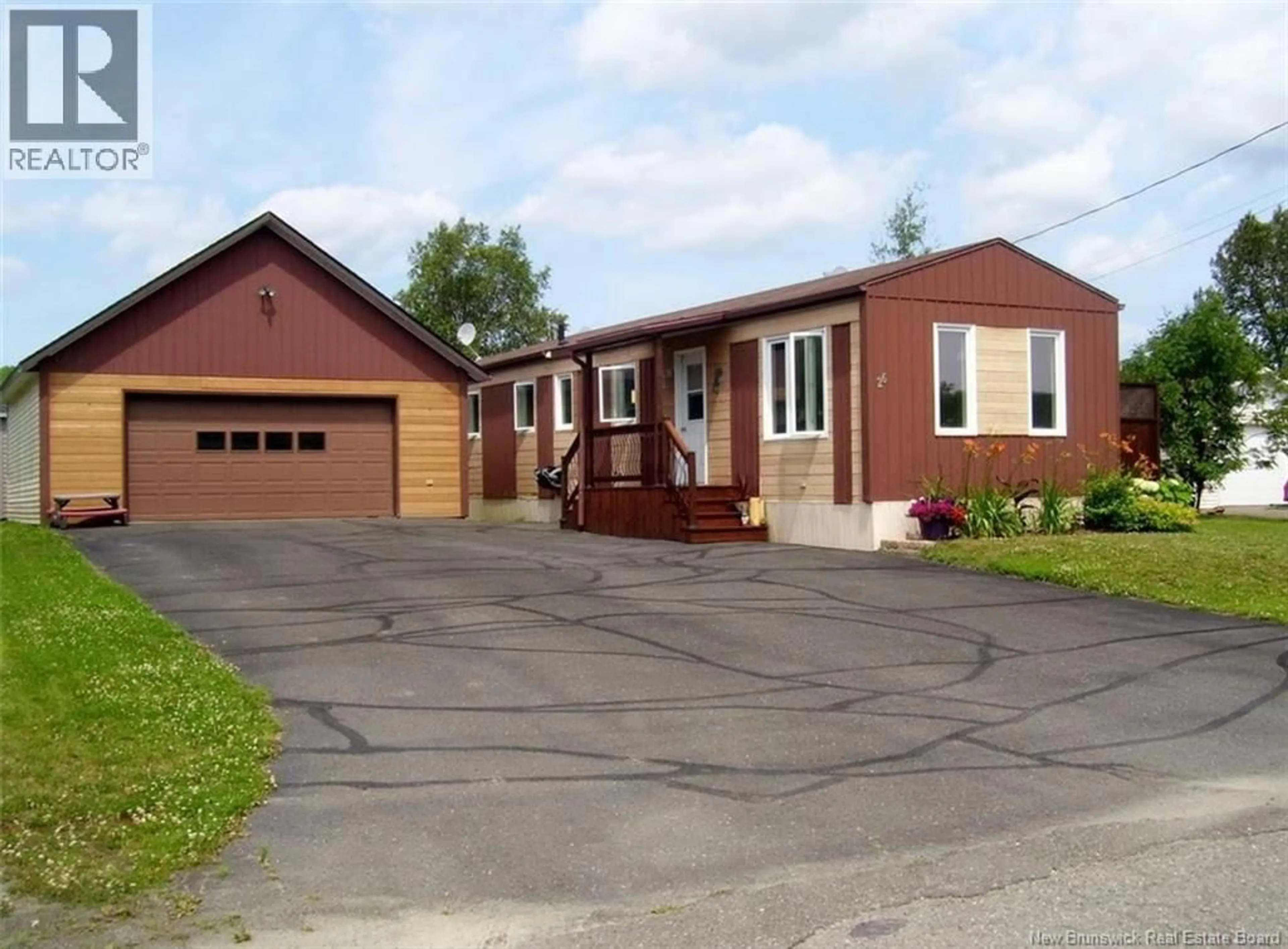 Home with vinyl exterior material, street for 26 LE PARADIS STREET, Saint-Jacques New Brunswick E7B1T7