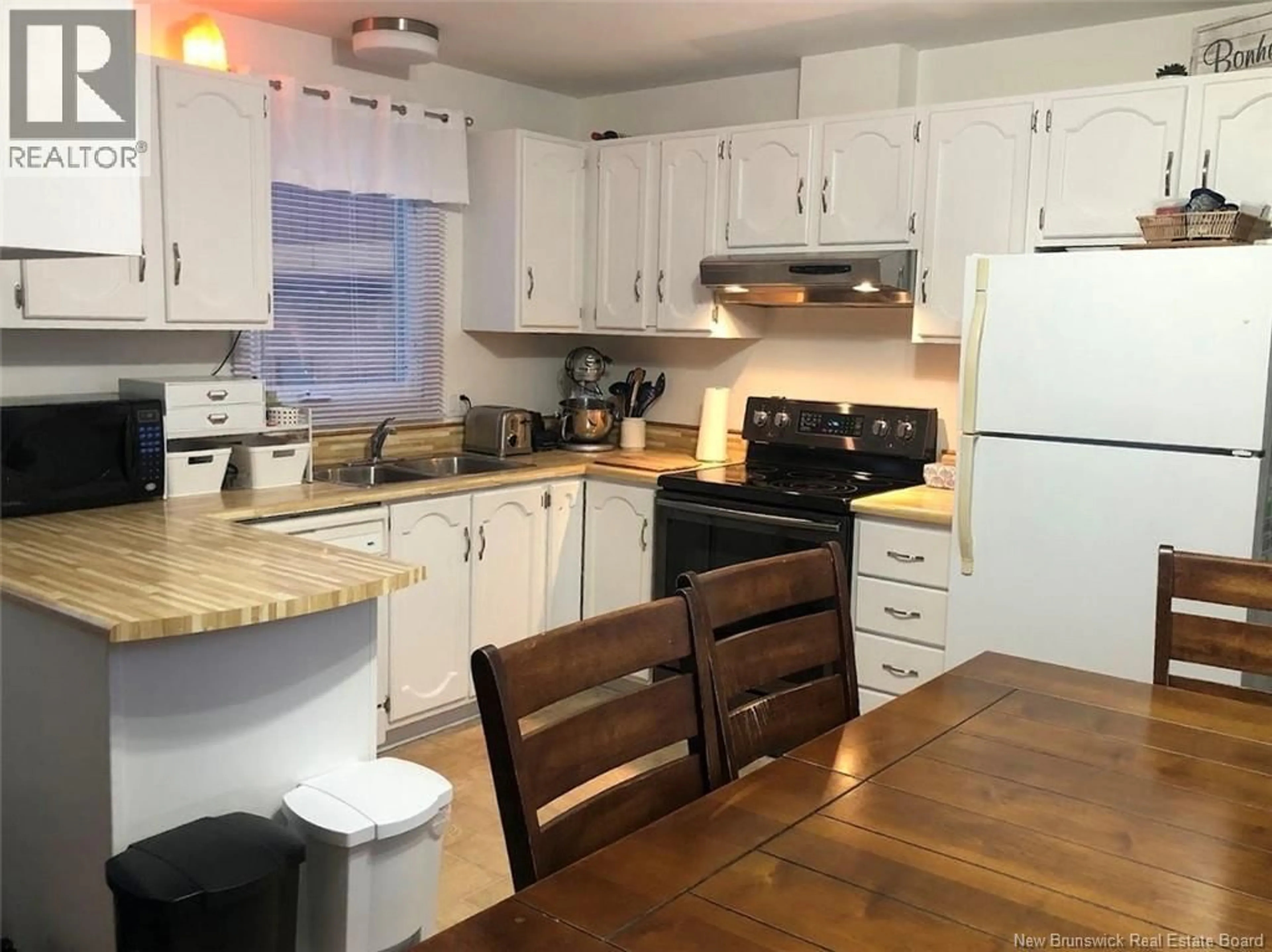 Standard kitchen, wood/laminate floor for 26 LE PARADIS STREET, Saint-Jacques New Brunswick E7B1T7