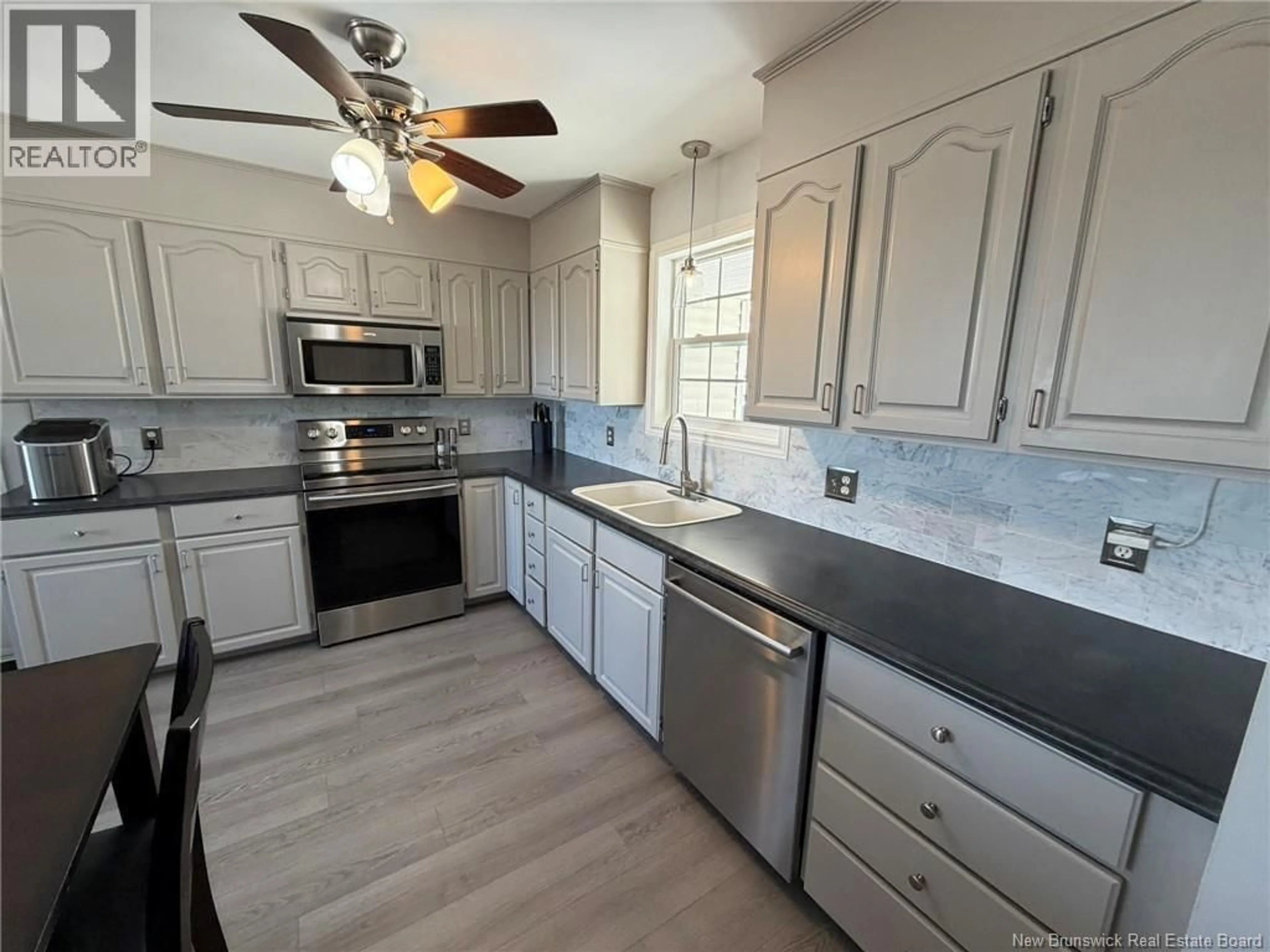 Open concept kitchen, ceramic/tile floor for 17 SHEPODY CRESCENT, Florenceville-Bristol New Brunswick E7L2X5