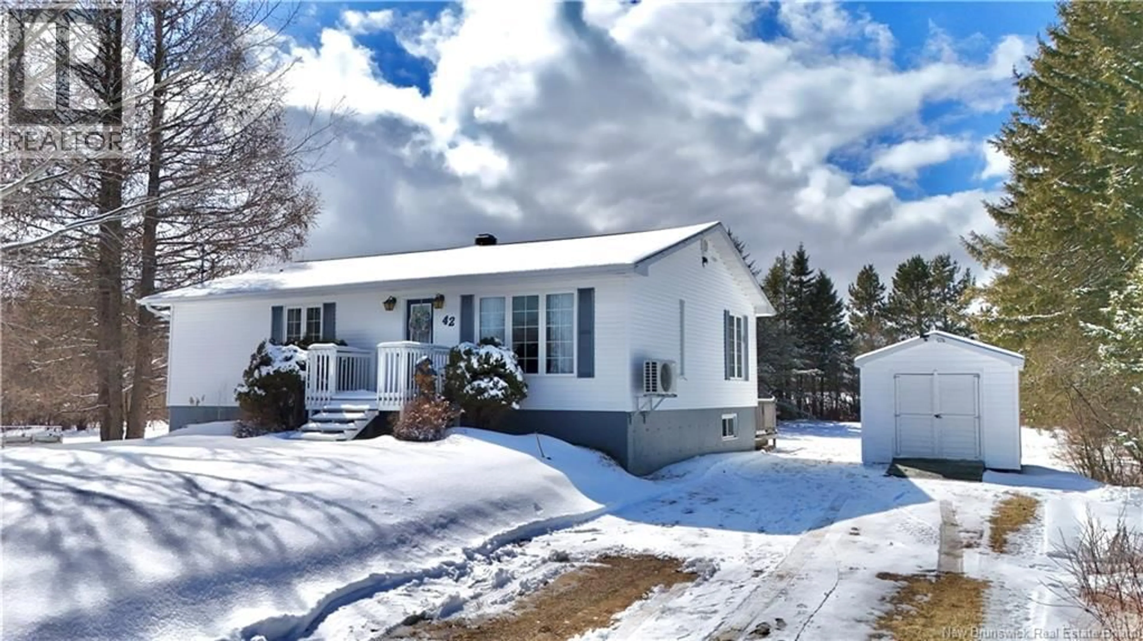 Home with vinyl exterior material, street for 42 SAINT ANDRE ROAD, Sainte-Anne New Brunswick E2A7Z2