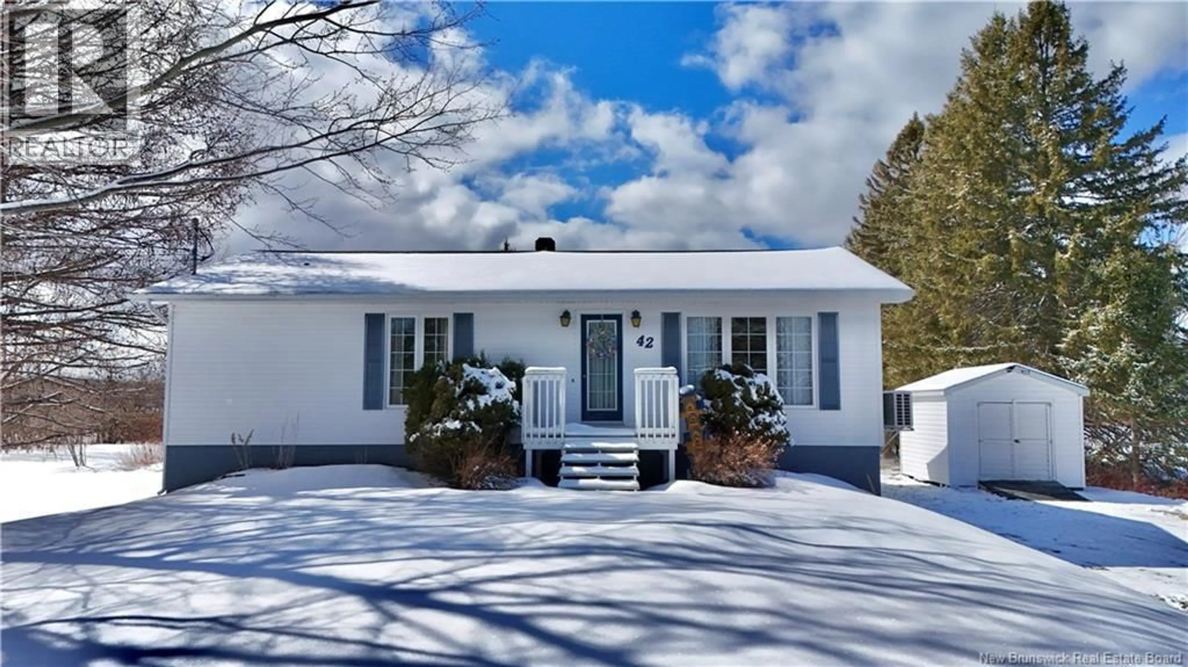 Home with vinyl exterior material, street for 42 SAINT ANDRE ROAD, Sainte-Anne New Brunswick E2A7Z2