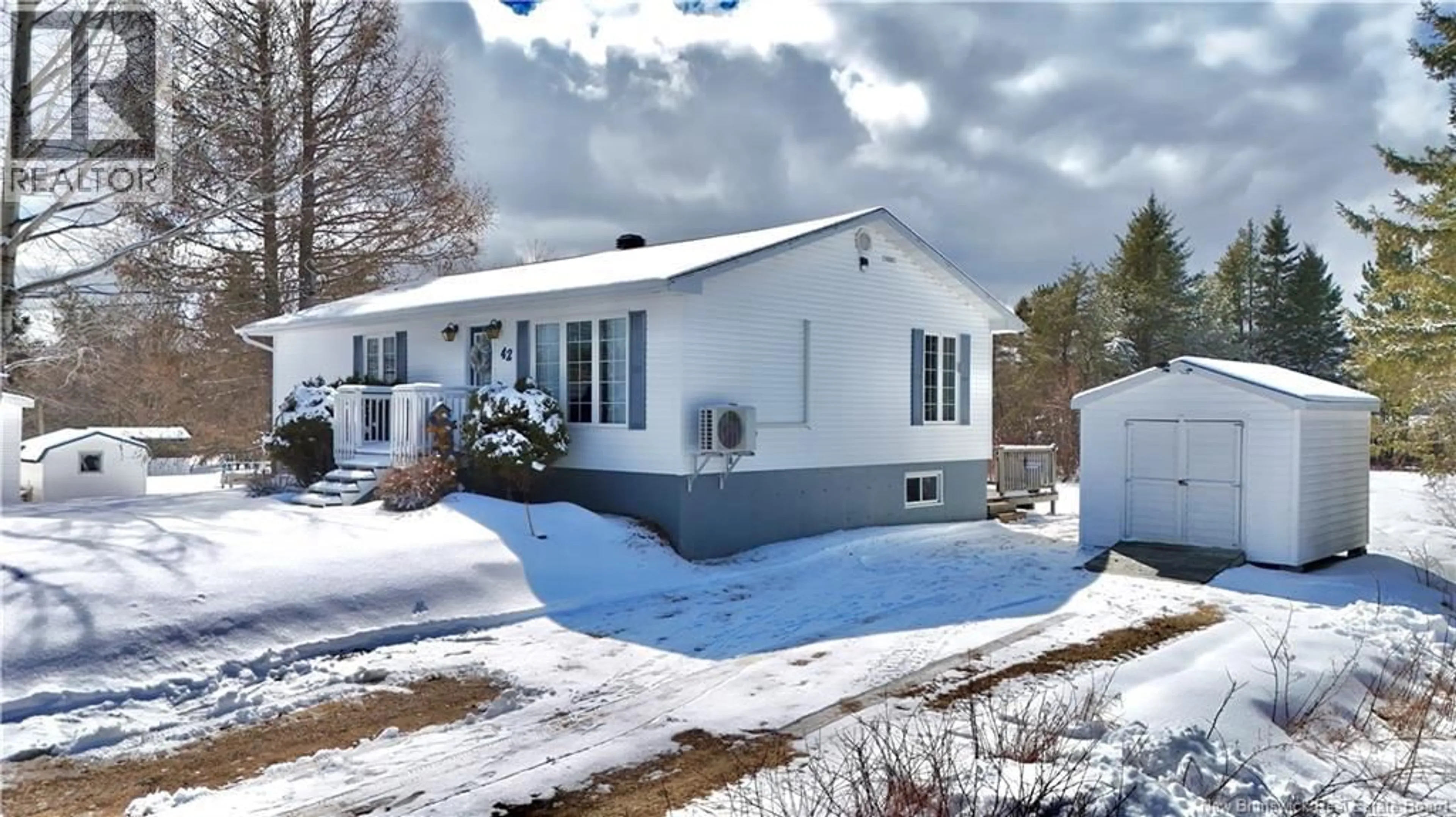 Home with vinyl exterior material, street for 42 SAINT ANDRE ROAD, Sainte-Anne New Brunswick E2A7Z2