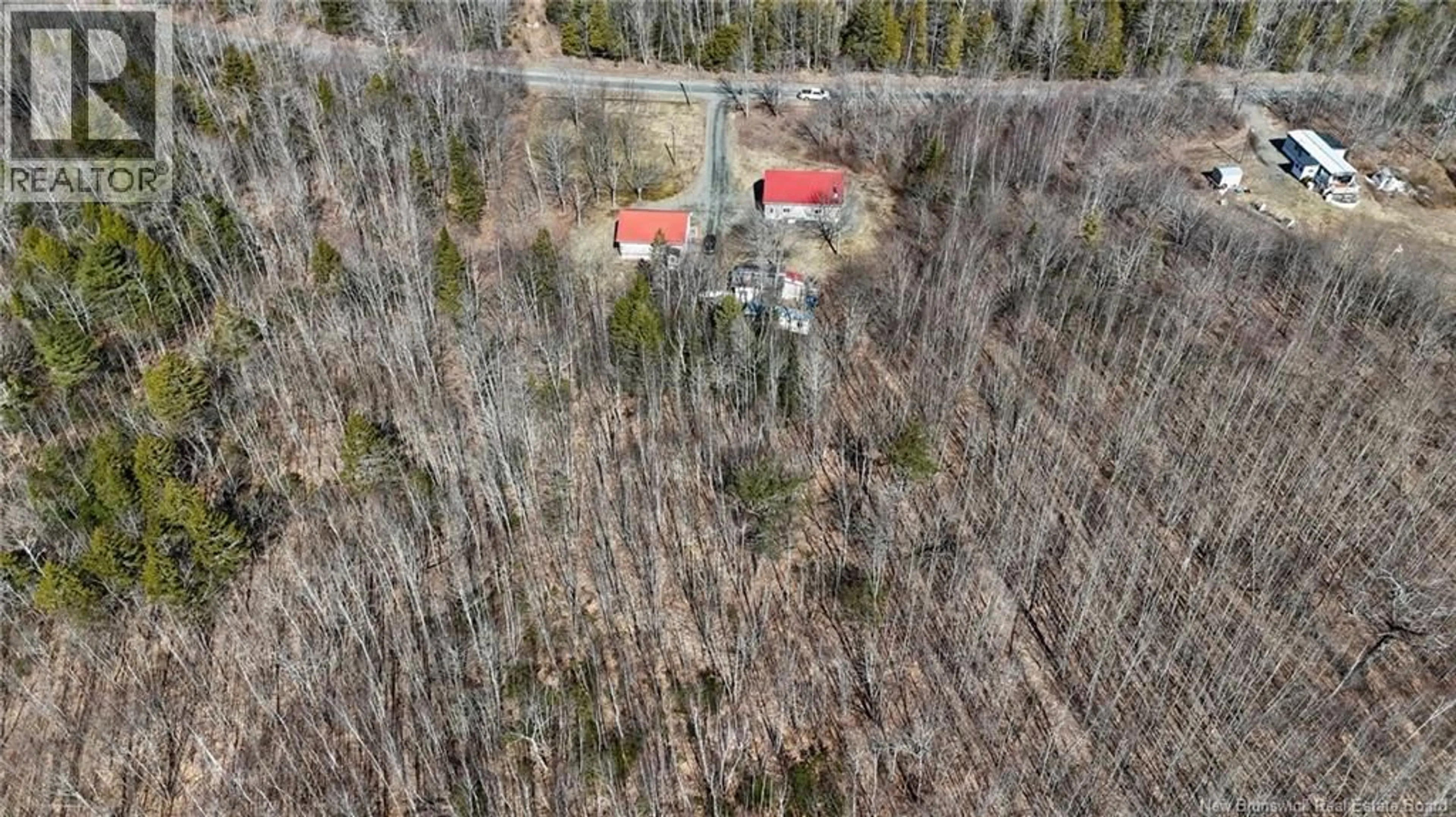 A pic from outside/outdoor area/front of a property/back of a property/a pic from drone, forest/trees view for 596 MOHANNES ROAD, St. Stephen New Brunswick E3L5V4