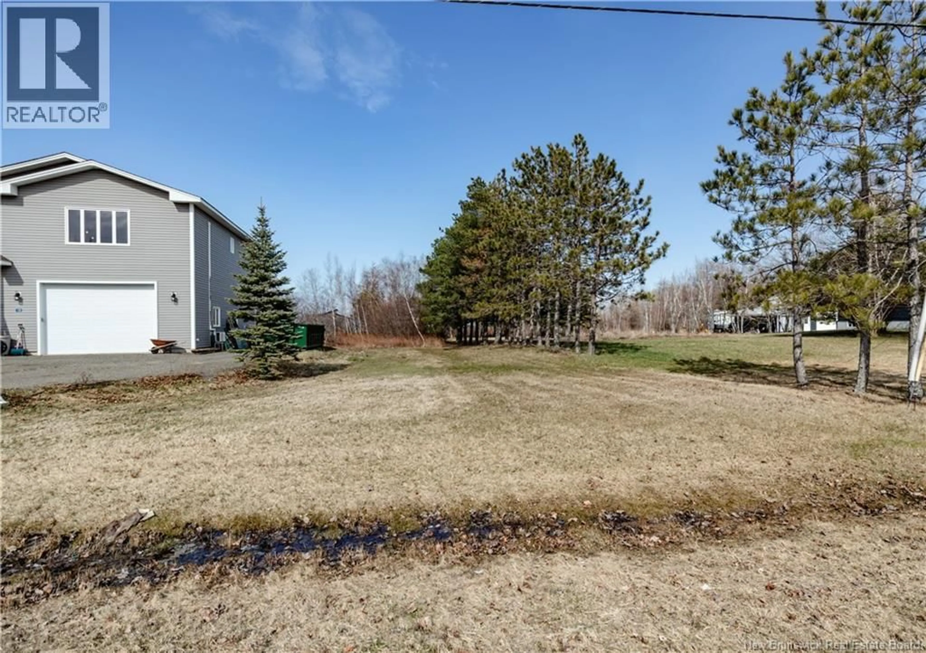 A pic from outside/outdoor area/front of a property/back of a property/a pic from drone, unknown for 18 LOUIS-BOURG ROAD, Bouctouche New Brunswick E4S3N7