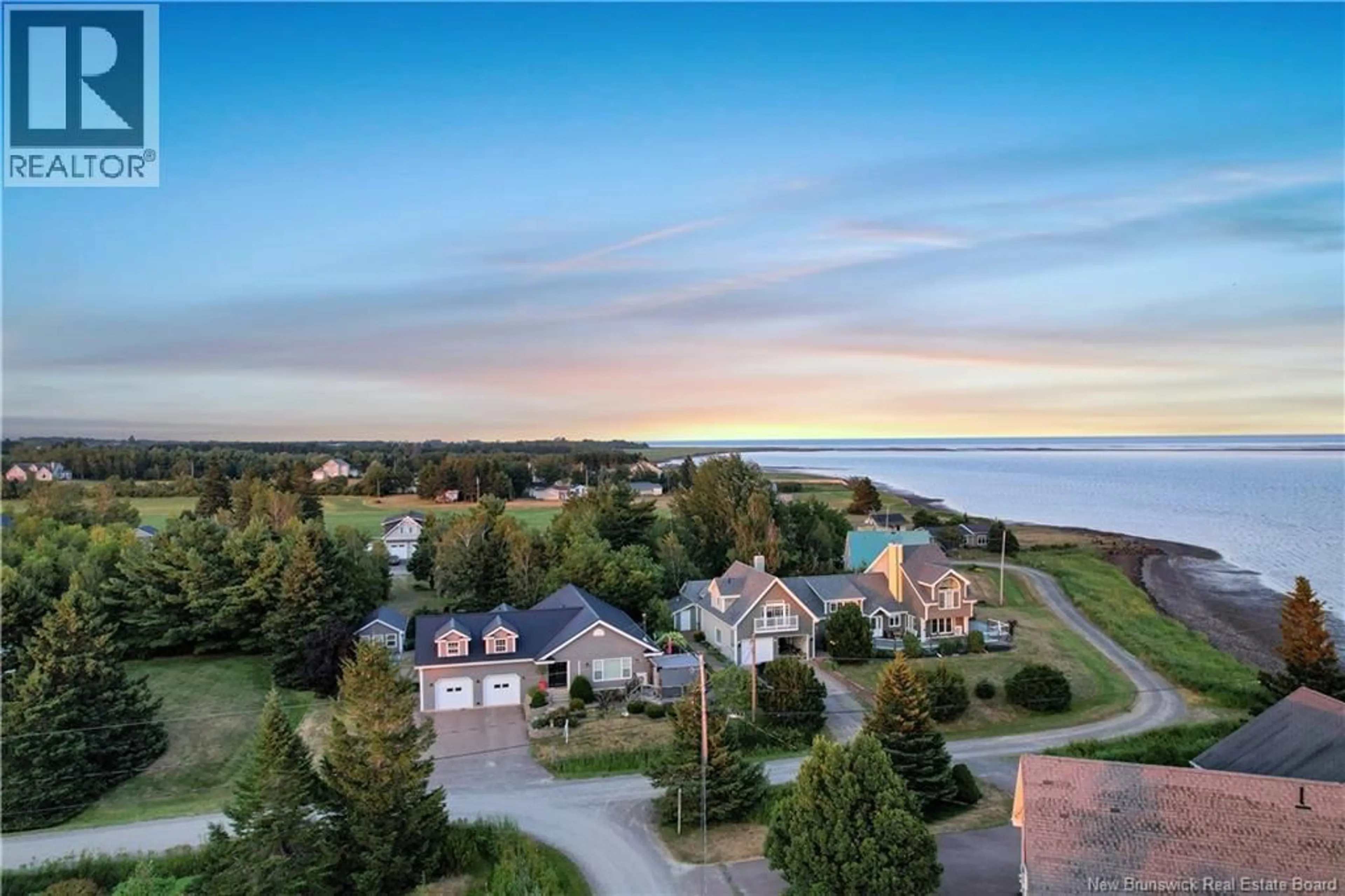 A pic from outside/outdoor area/front of a property/back of a property/a pic from drone, water/lake/river/ocean view for 75 LOUIS-A-CHARLES STREET, Grande-Digue New Brunswick E4R4S3