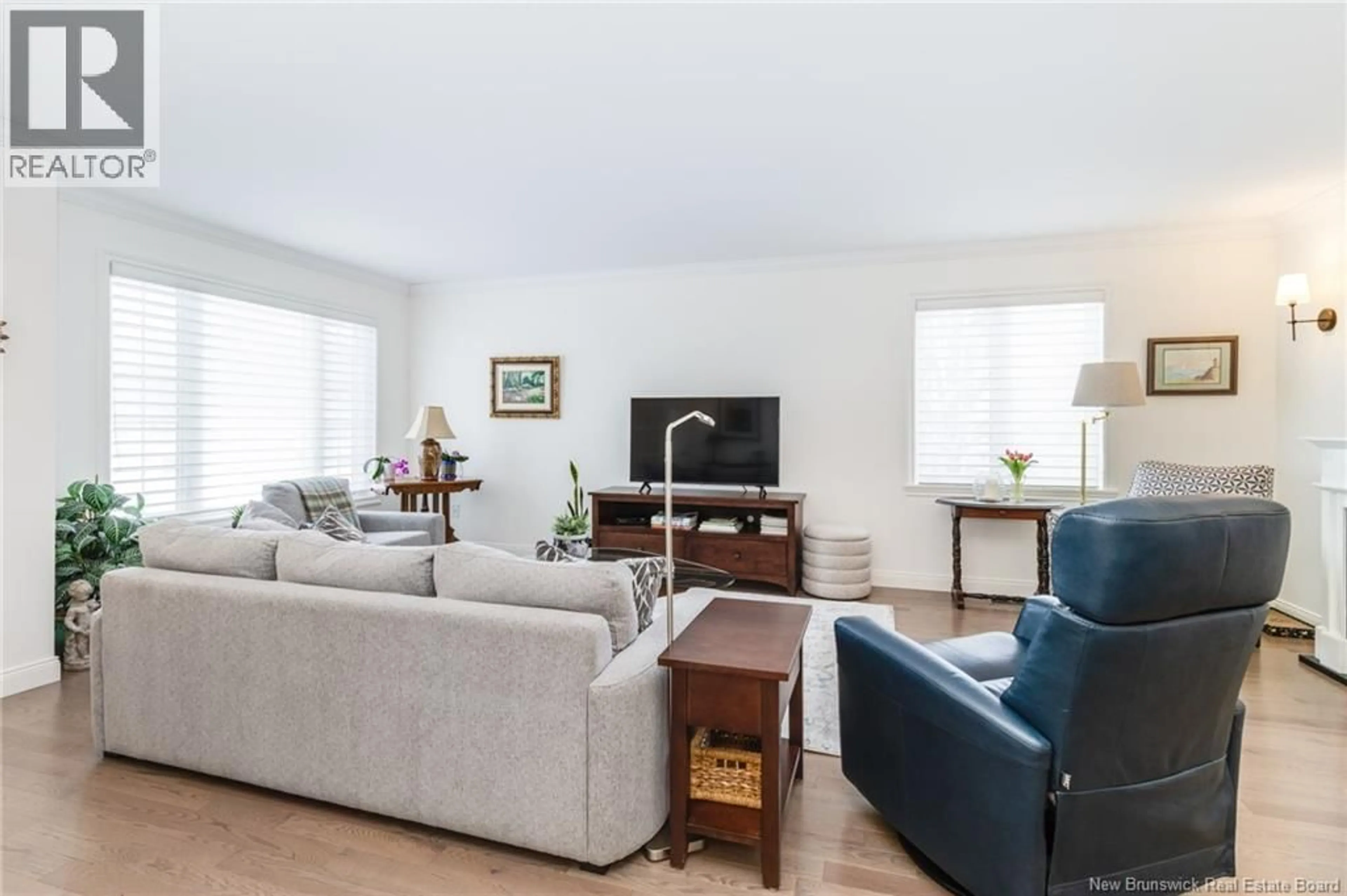 Living room with furniture, wood/laminate floor for 4 WAYNE LANE, Fredericton New Brunswick E3B9S6