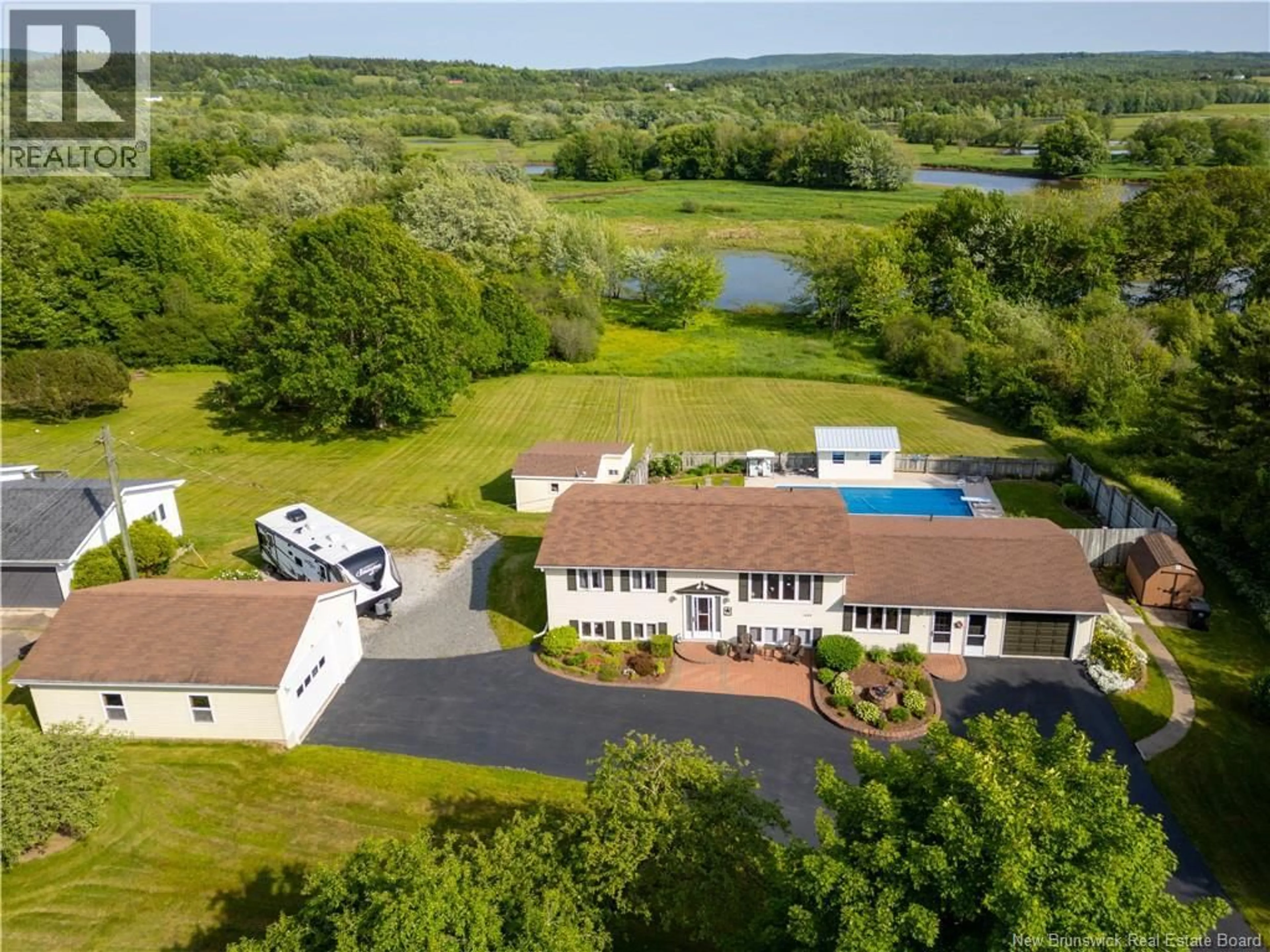 A pic from outside/outdoor area/front of a property/back of a property/a pic from drone, water/lake/river/ocean view for 1496 MAIN STREET, Hampton New Brunswick E5N6H1