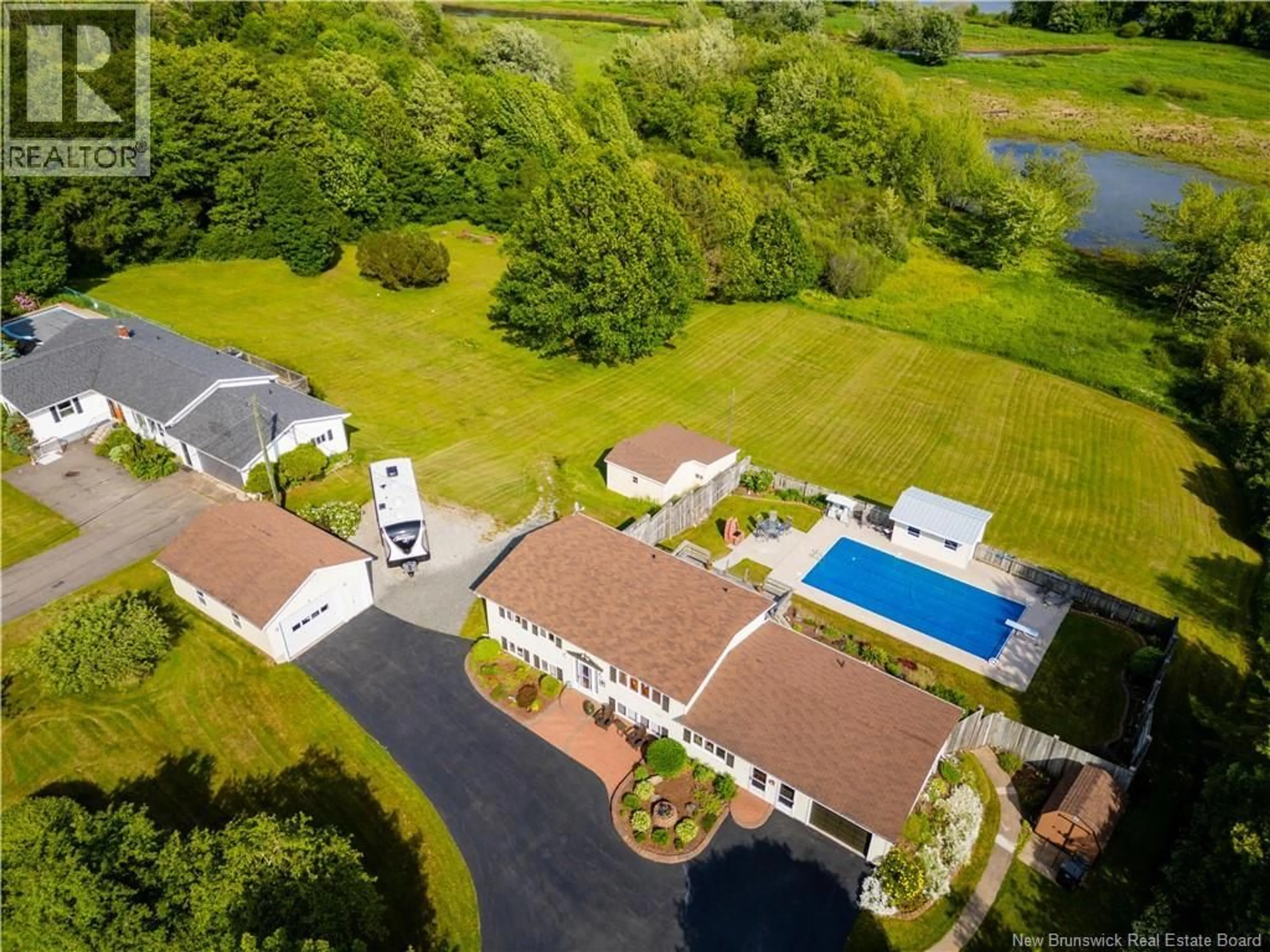 A pic from outside/outdoor area/front of a property/back of a property/a pic from drone, water/lake/river/ocean view for 1496 MAIN STREET, Hampton New Brunswick E5N6H1