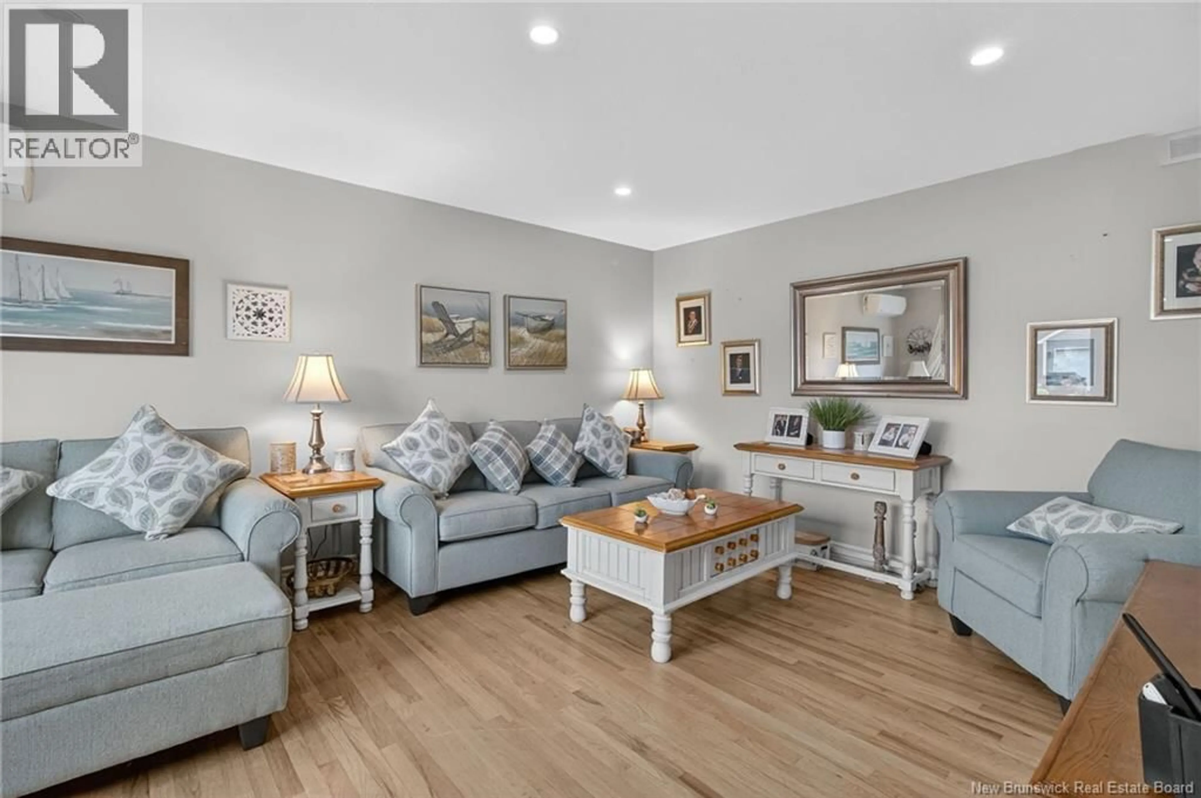 Living room with furniture, wood/laminate floor for 20 VANESSA COURT, Riverview New Brunswick E1B4W7