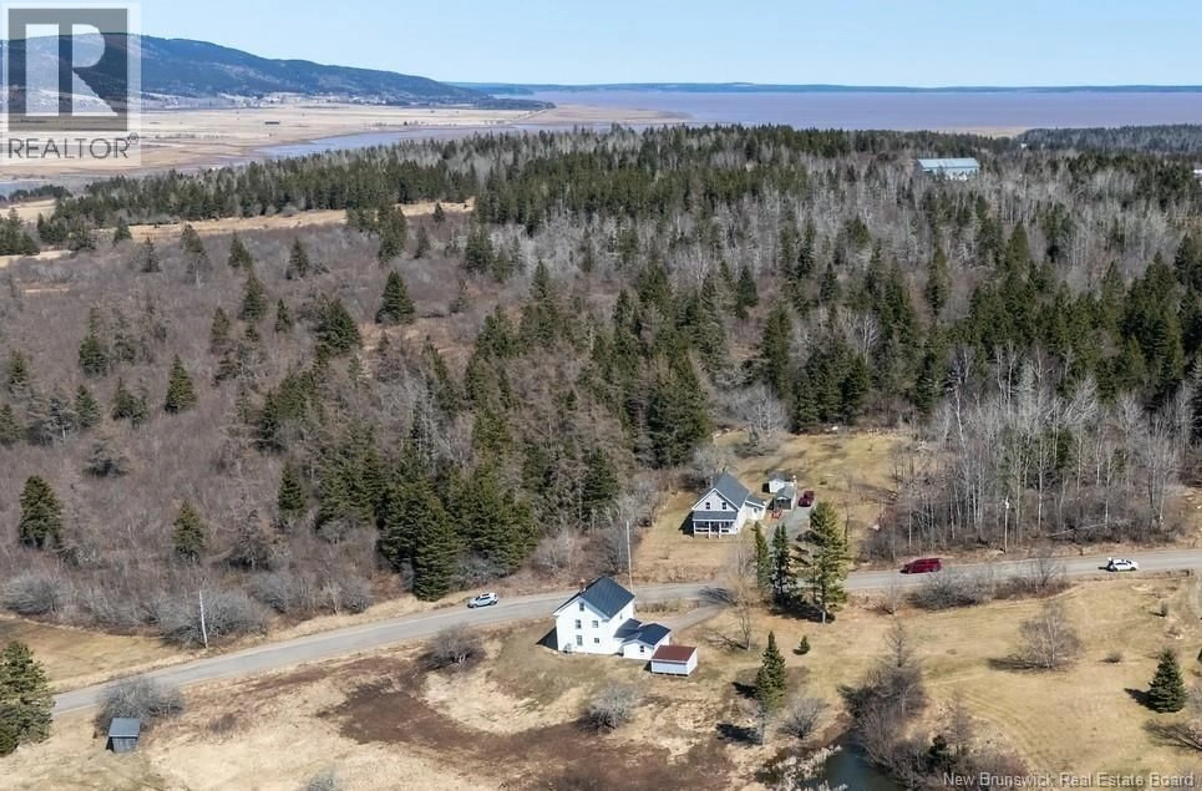 A pic from outside/outdoor area/front of a property/back of a property/a pic from drone, water/lake/river/ocean view for 386 ROUTE 915, Harvey Bank New Brunswick E4H2M2