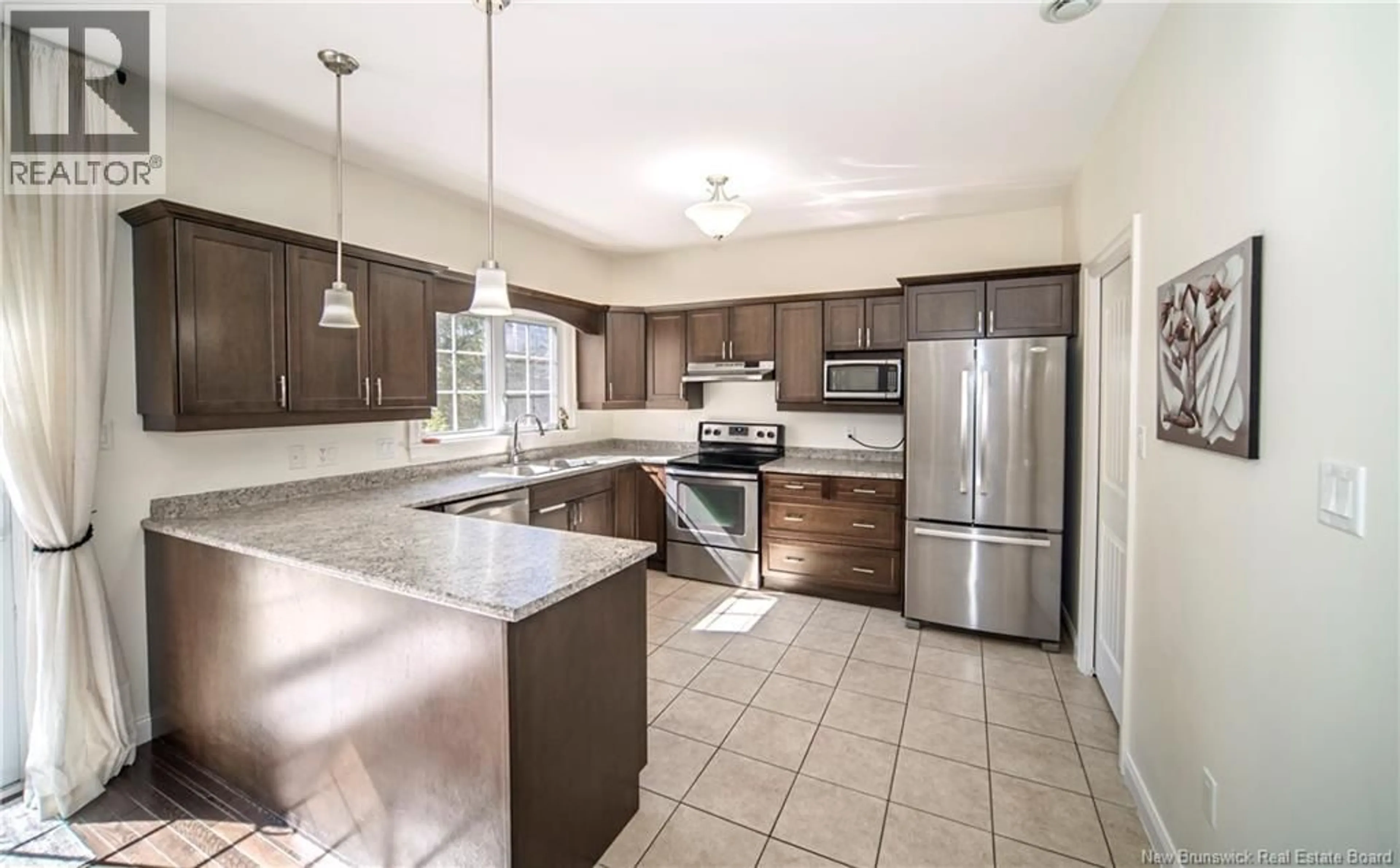 Open concept kitchen, ceramic/tile floor for 20 HILLSIDE LANE, Fredericton New Brunswick E3B0P8