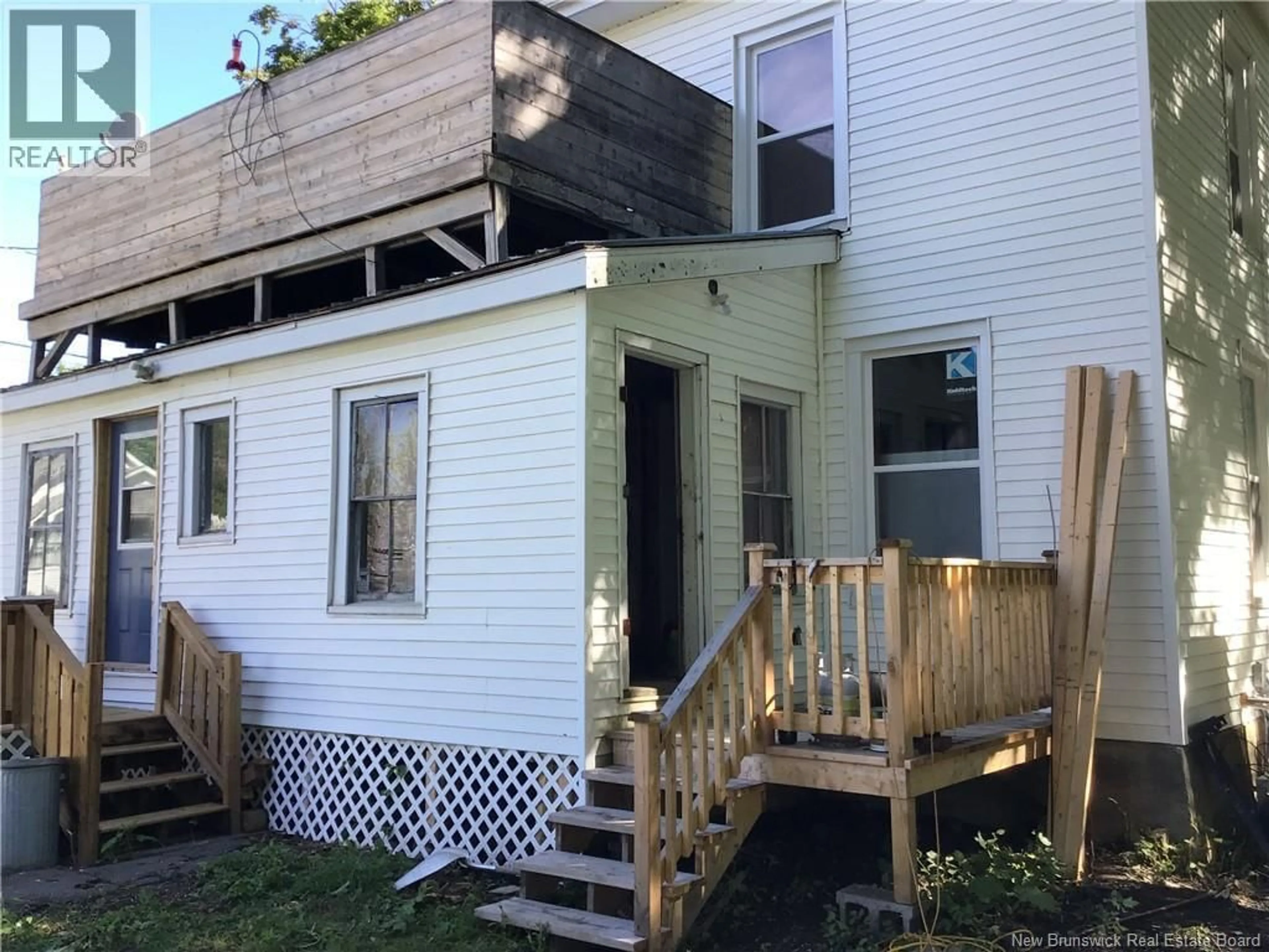 Home with vinyl exterior material, street for 16 DOW STREET, St. Stephen New Brunswick E3L1R9
