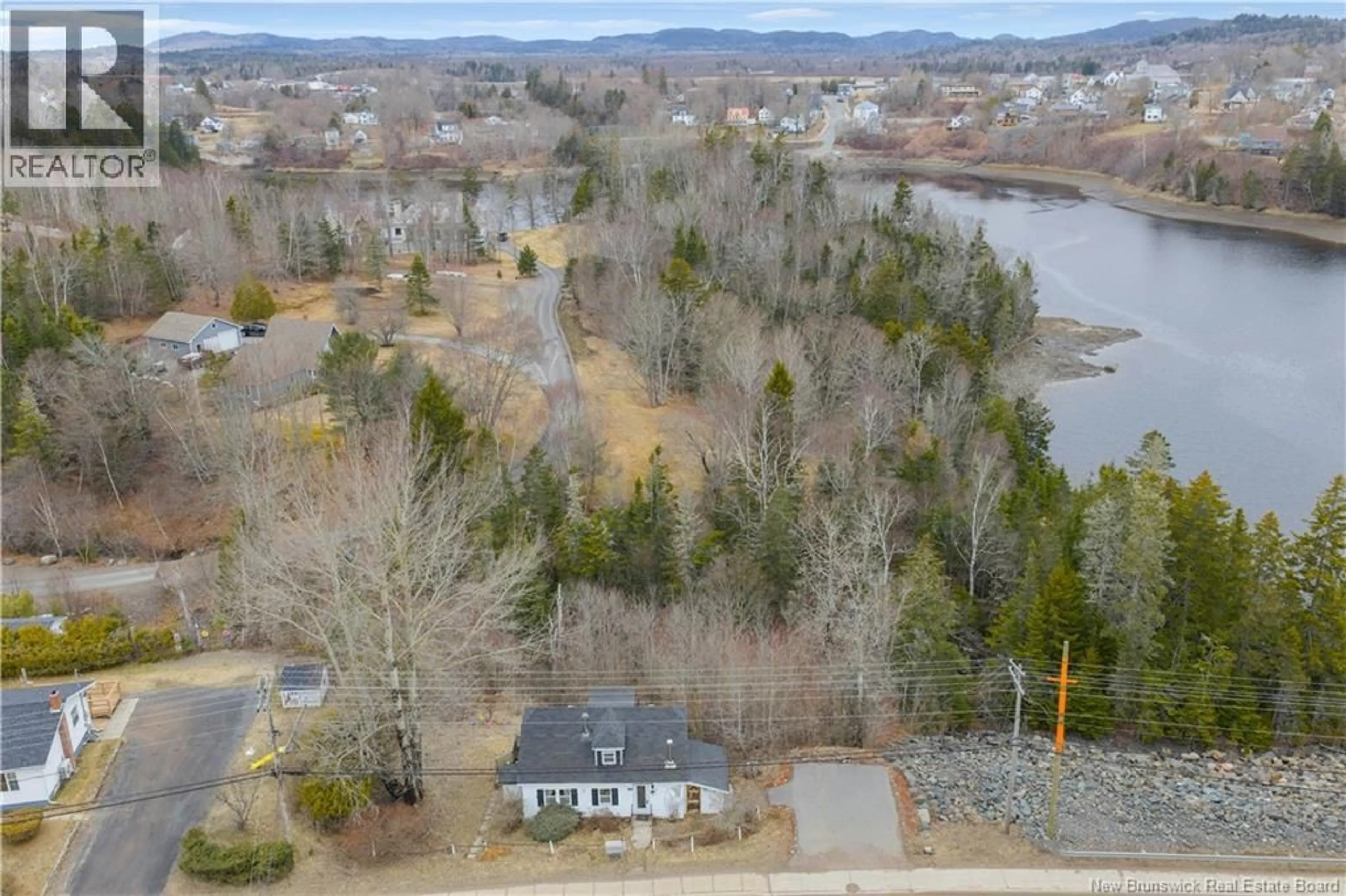 A pic from outside/outdoor area/front of a property/back of a property/a pic from drone, water/lake/river/ocean view for 106 L'ETETE ROAD, St George New Brunswick E5C3H6