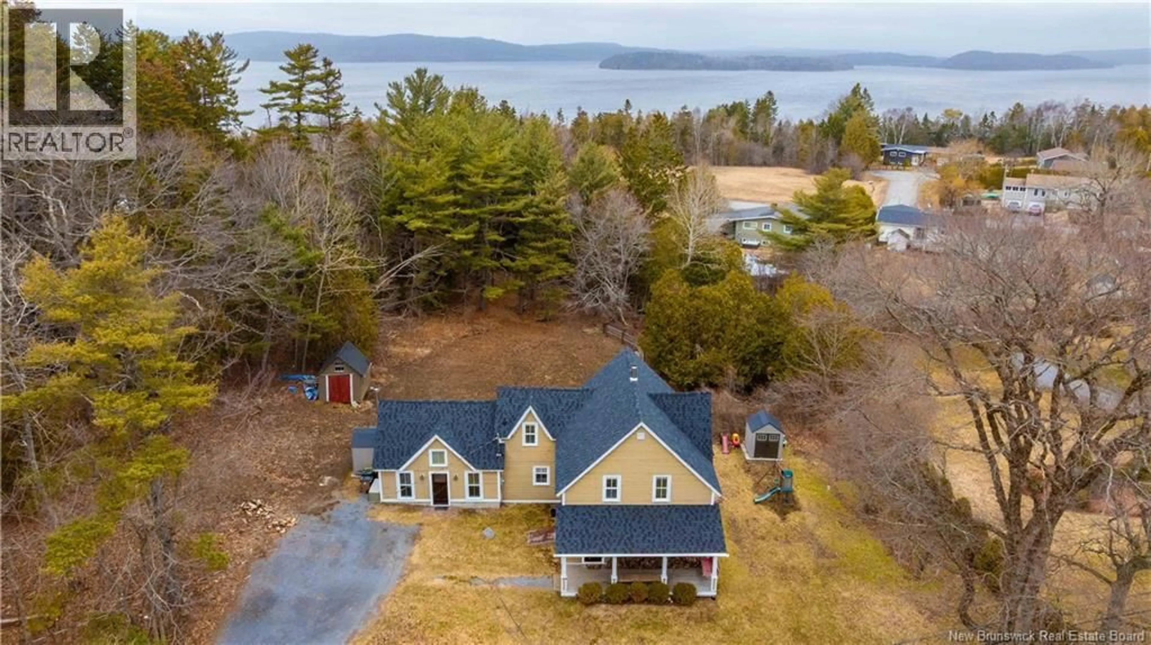 A pic from outside/outdoor area/front of a property/back of a property/a pic from drone, water/lake/river/ocean view for 2574 WESTFIELD ROAD, Saint John New Brunswick E2M6N1