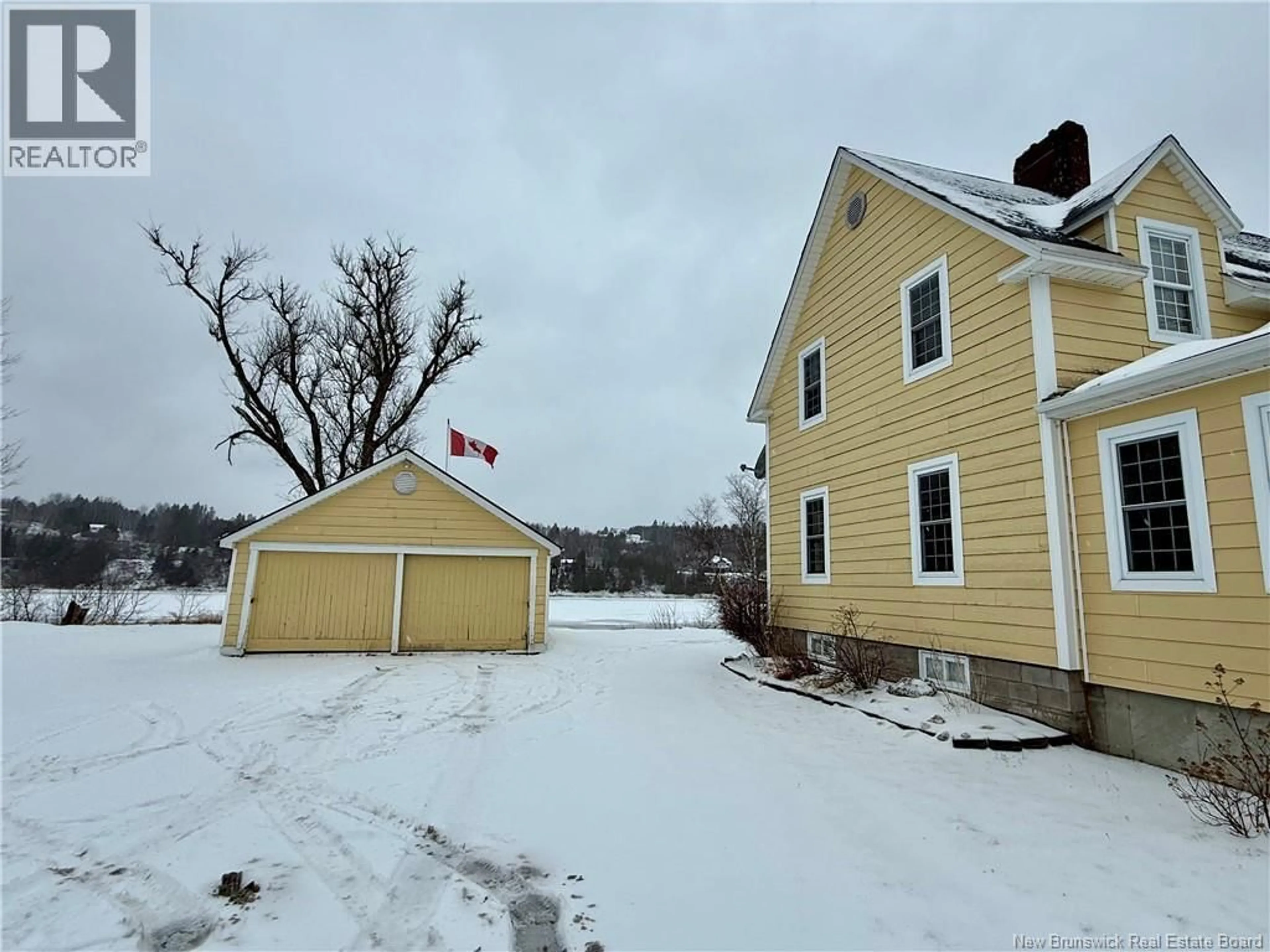 A pic from outside/outdoor area/front of a property/back of a property/a pic from drone, unknown for 557 EAST RIVERSIDE DRIVE, Perth-Andover New Brunswick E7H1Y4